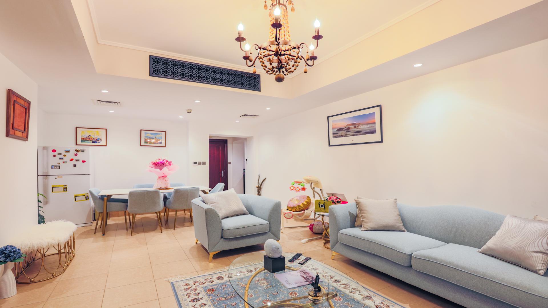 Living room in Zanzebeel 2-bedroom apartment, Old Town, with elegant decor and balcony view