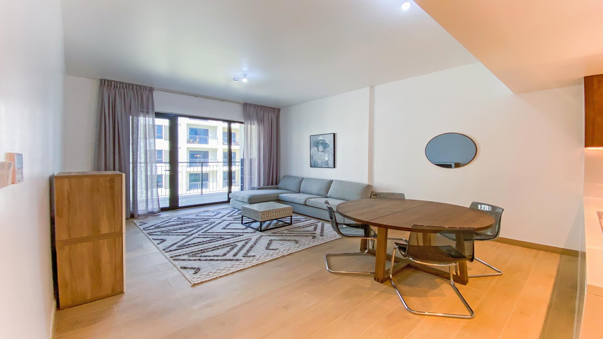 "Modern kitchen in furnished 2-bedroom apartment, La Mer, Jumeirah, available for rent.",Brand new furnished apartment living room in La Mer, Jumeirah, featuring modern decor
