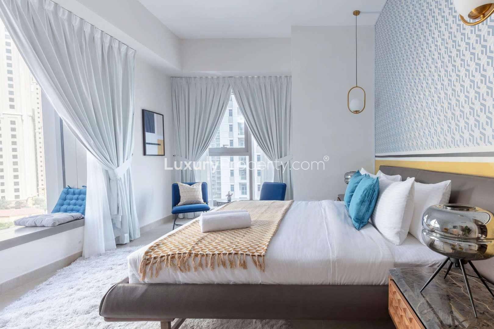 Modern bedroom in 2-bedroom apartment, Sparkle Towers, Dubai Marina, featuring stylish decor