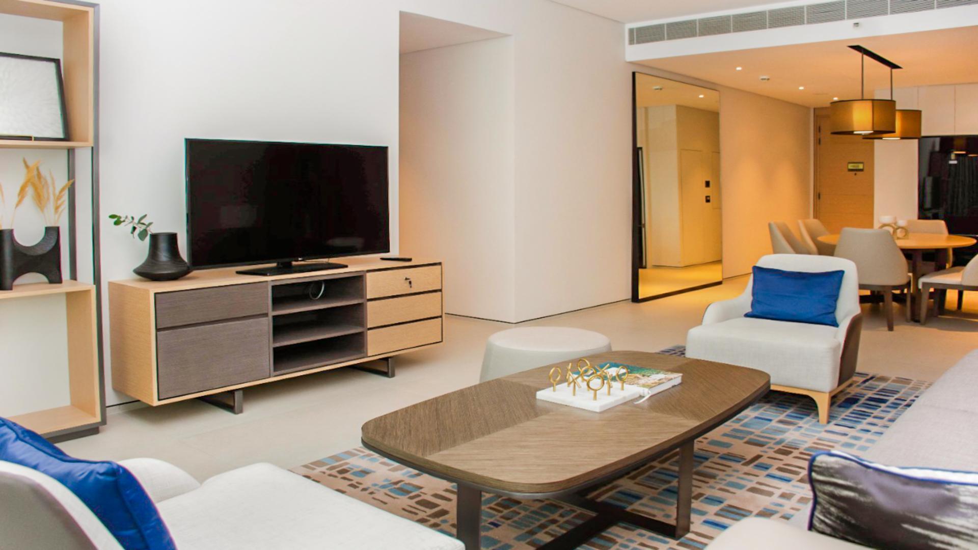 Furnished apartment dining and living area at Jumeirah Beach Residence, sea views