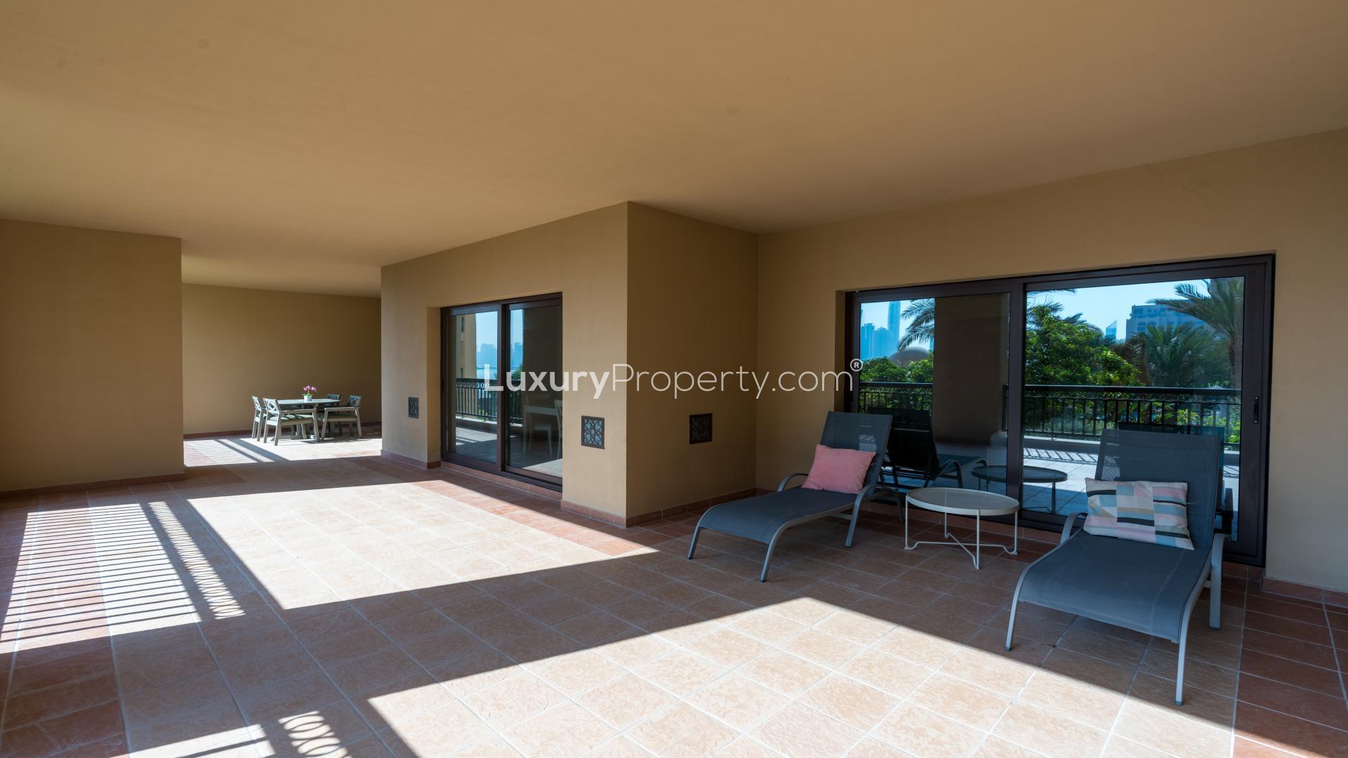 Spacious balcony with pool view at The Fairmont Palm Residence, Palm Jumeirah apartment