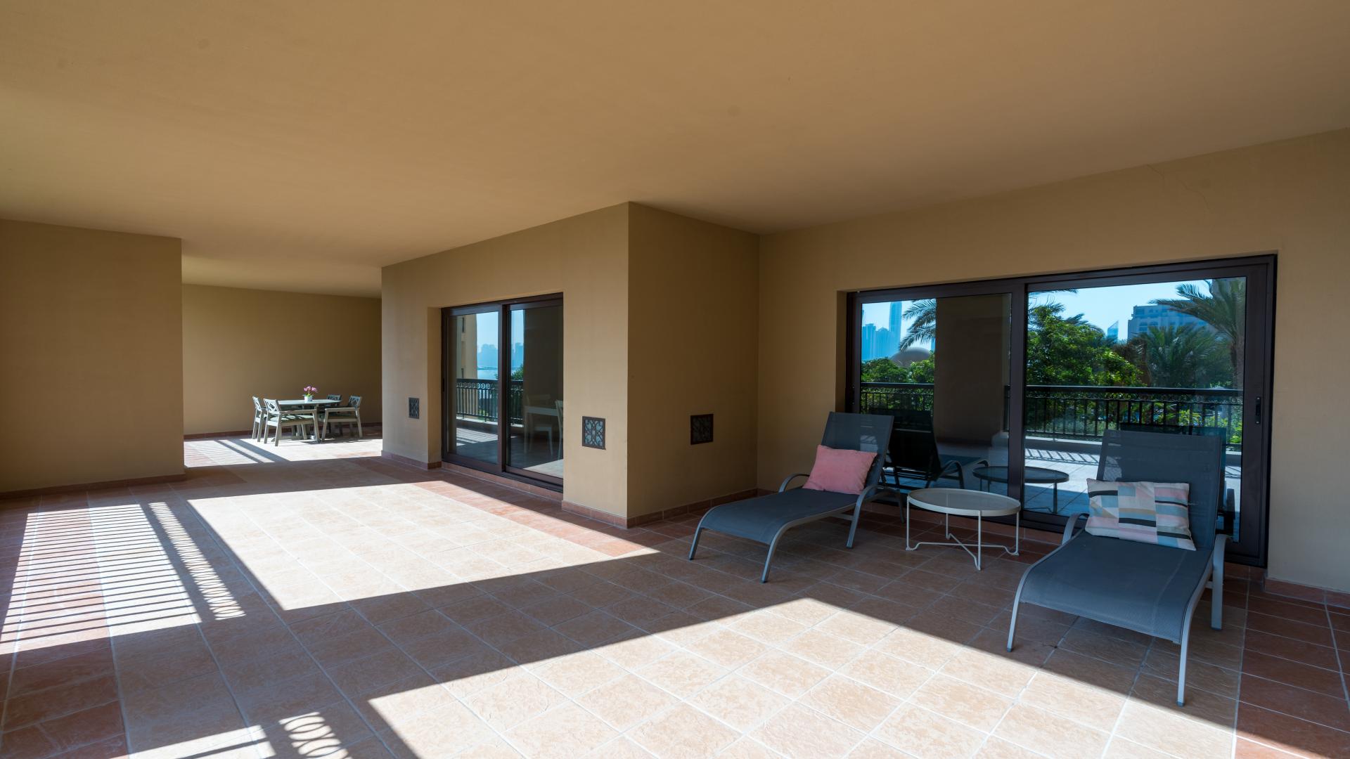 Spacious balcony with pool view at The Fairmont Palm Residence, Palm Jumeirah apartment