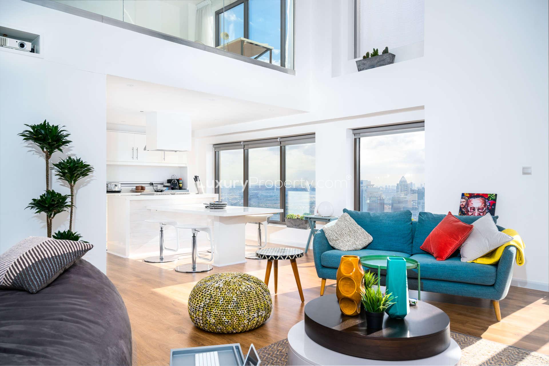 Modern 2-bedroom loft living area in Jumeirah Beach Residence, Dubai with city views