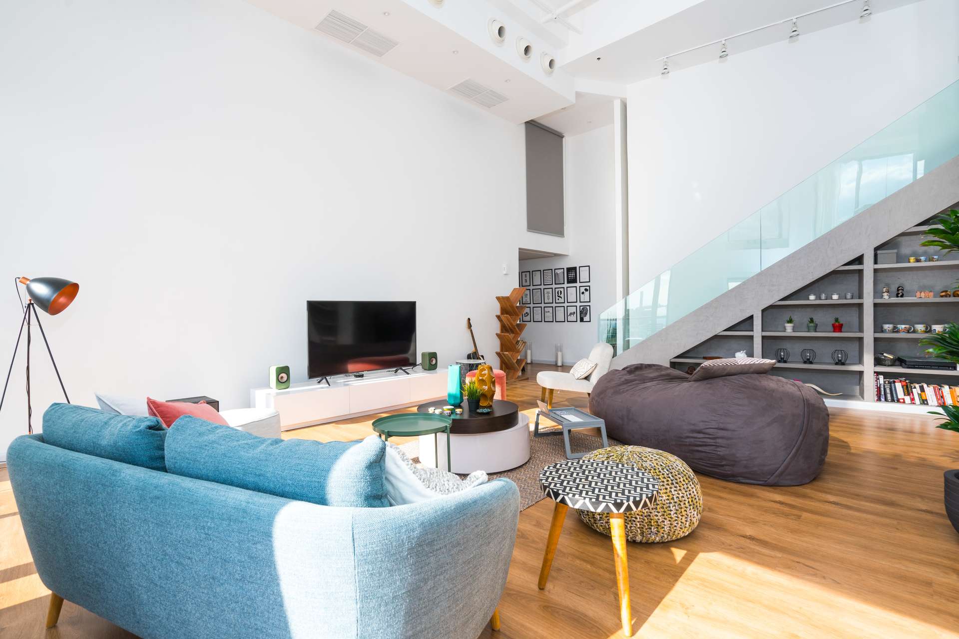 Modern living room in 2-bedroom loft apartment, Jumeirah Beach Residence, Dubai, with city views