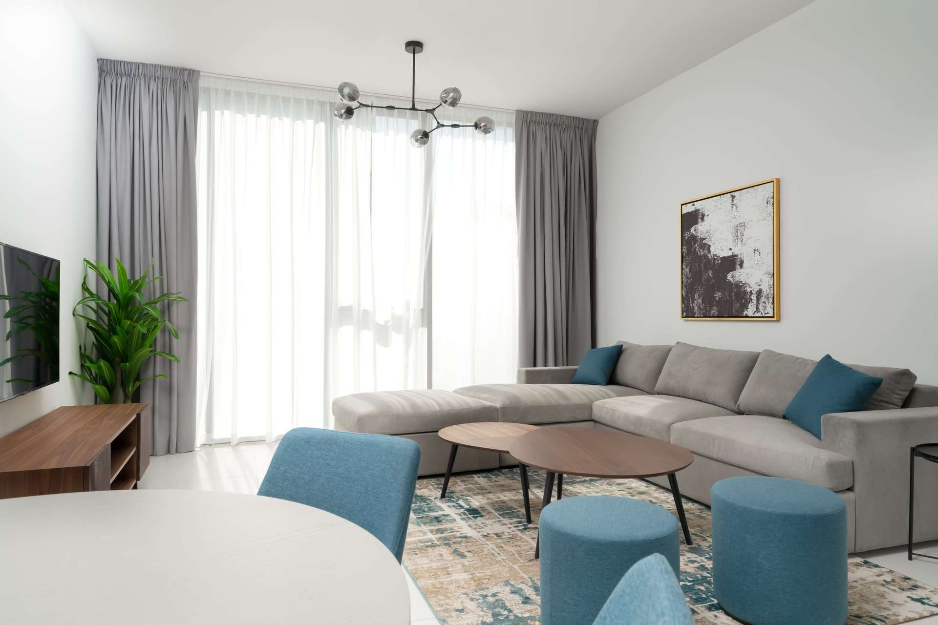 Modern kitchen and dining area in Soho Palm Jumeirah penthouse, open layout design