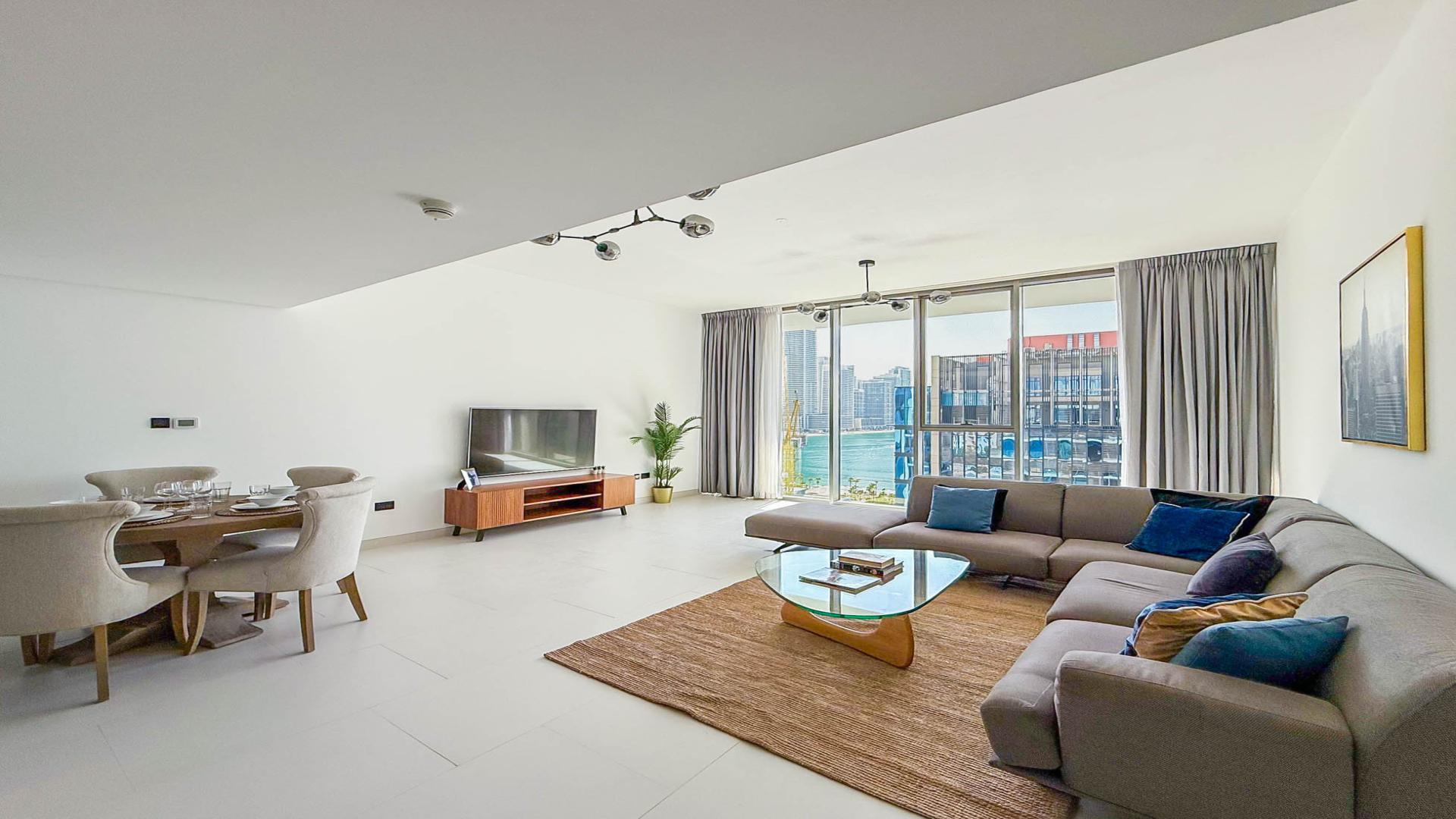 N/A,Modern living room in Soho Palm Jumeirah penthouse with city view, elegant furniture, and decor