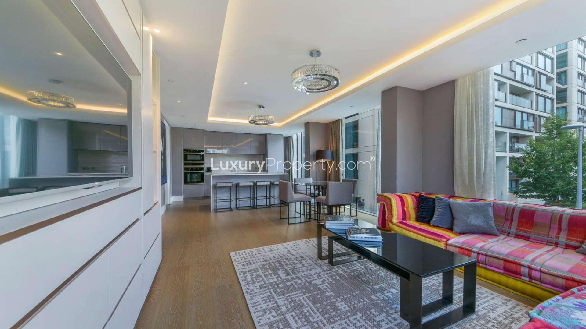 Modern kitchen in spacious Kensington penthouse, featuring sleek design and contemporary artwork