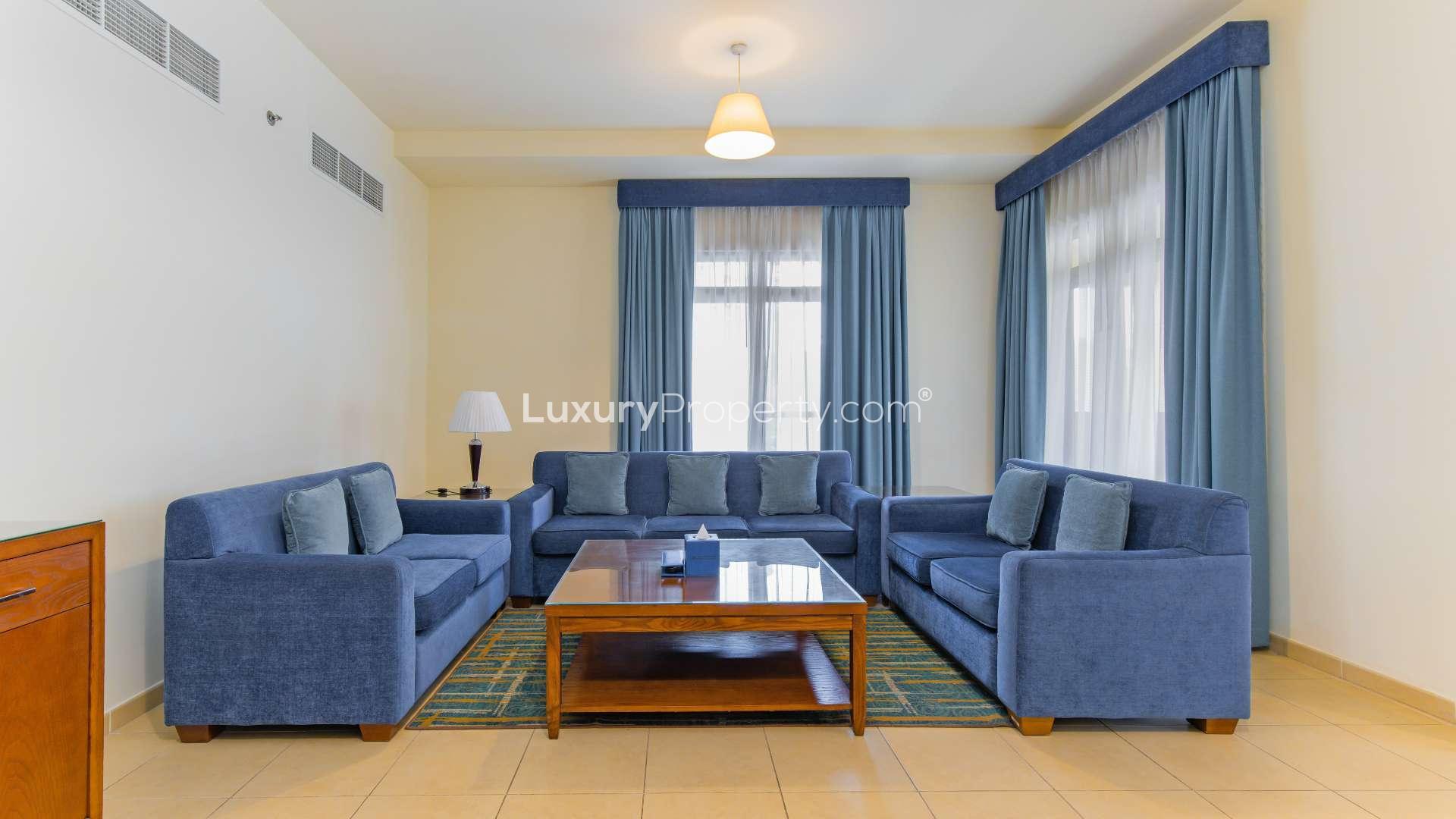 Balcony view from serviced apartment in Jumeirah Beach Residence, Amwaj, overlooking marina skyline