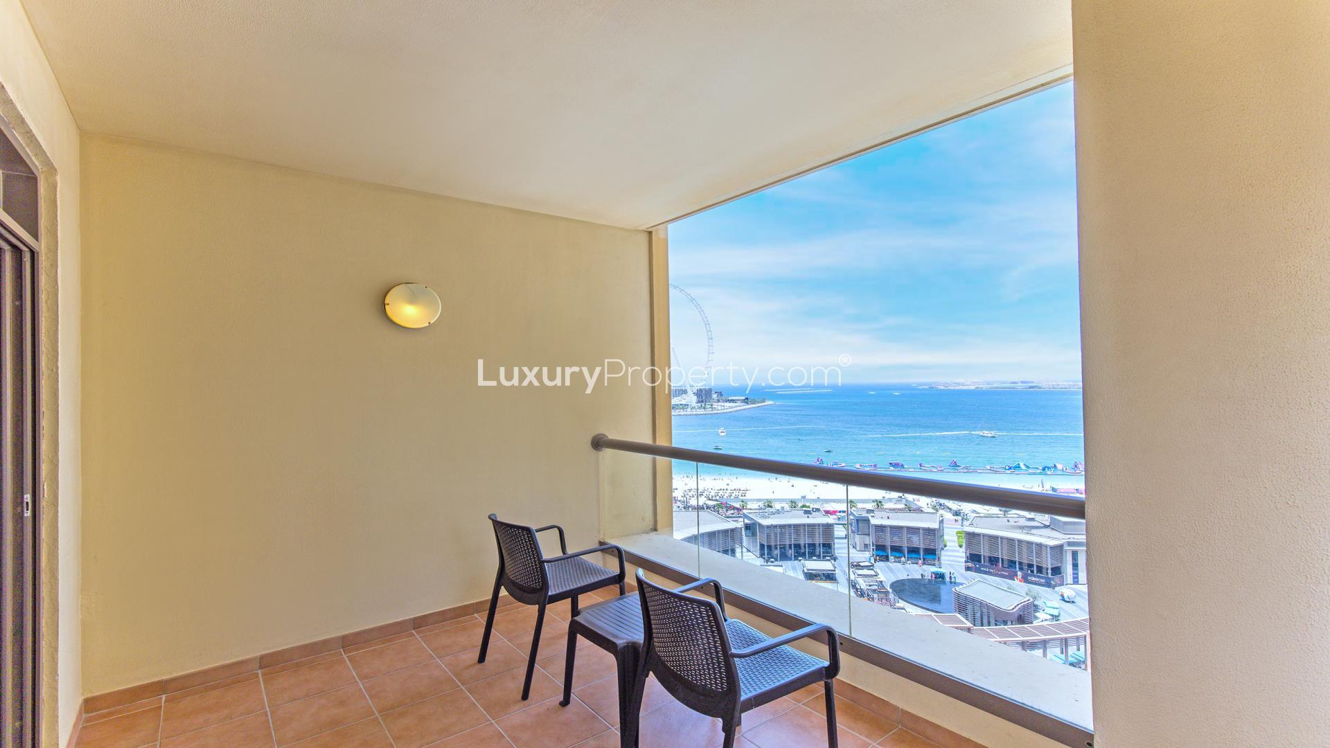 Living room in serviced apartment, Jumeirah Beach Residence, with sea view and modern furnishings