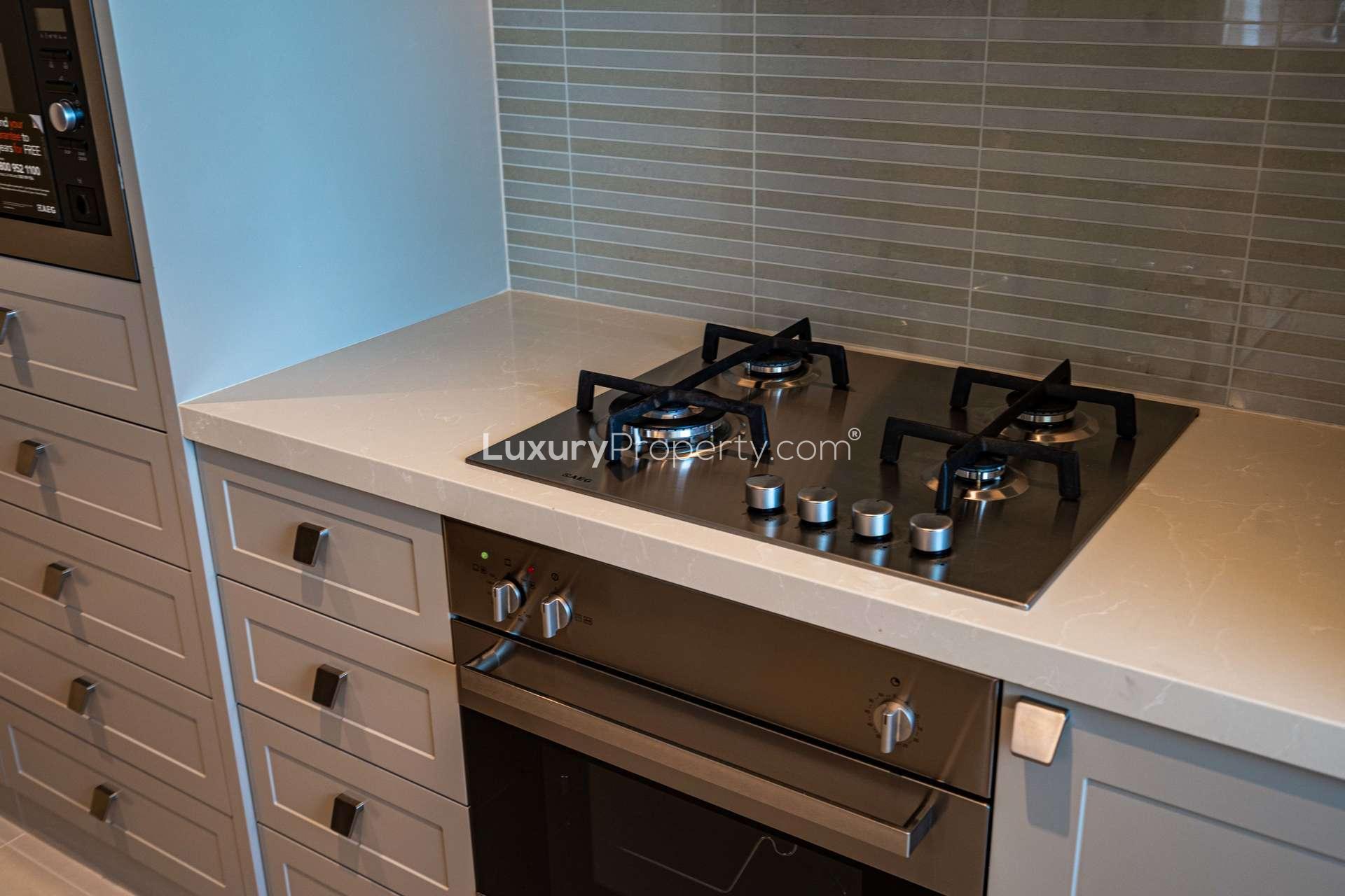 Modern kitchen in 2-bedroom serviced apartment, The Address Fountain Views, Downtown Dubai