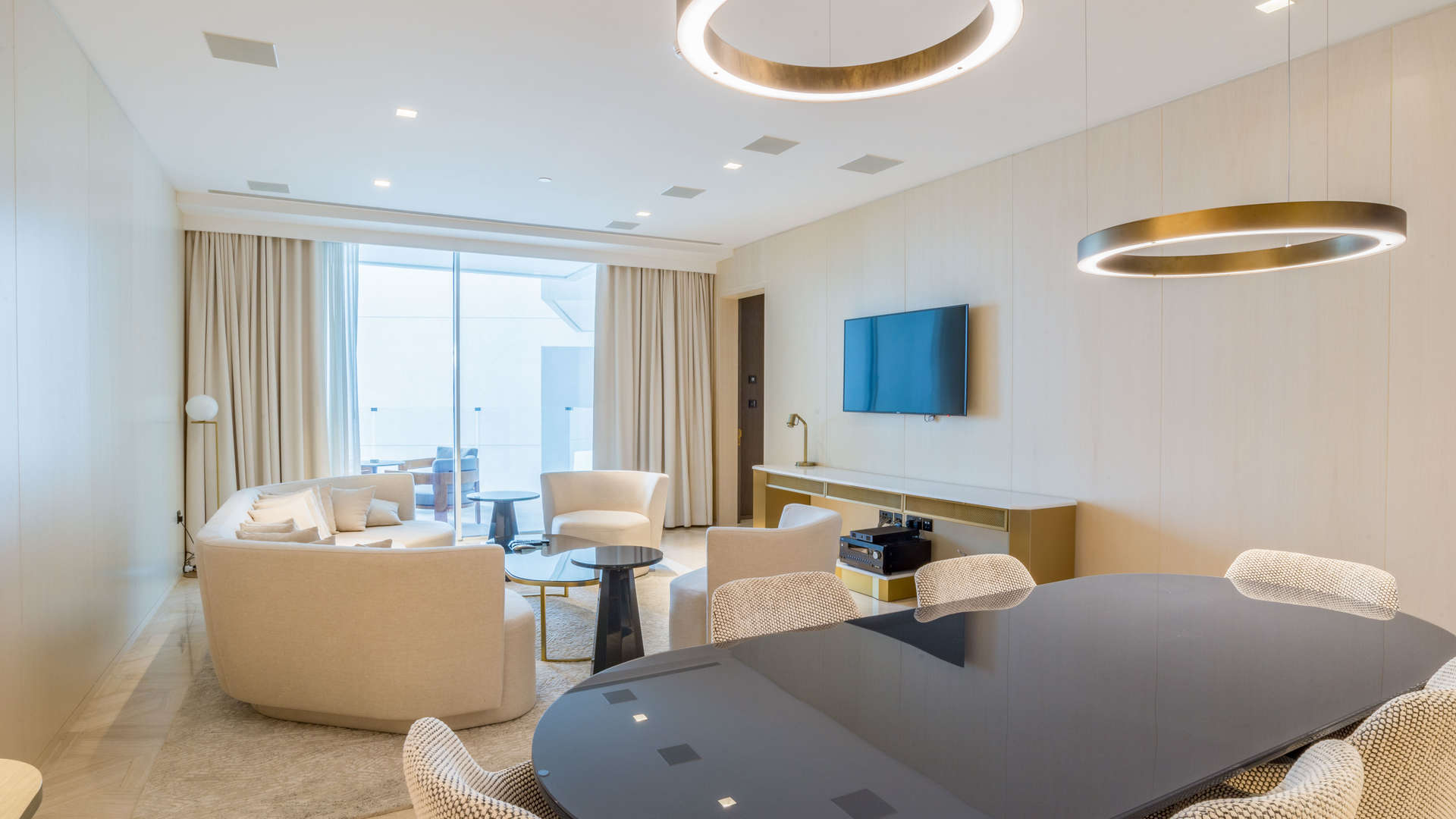 Modern living room in Palm Jumeirah two-bedroom serviced apartment, featuring elegant furnishings and decor