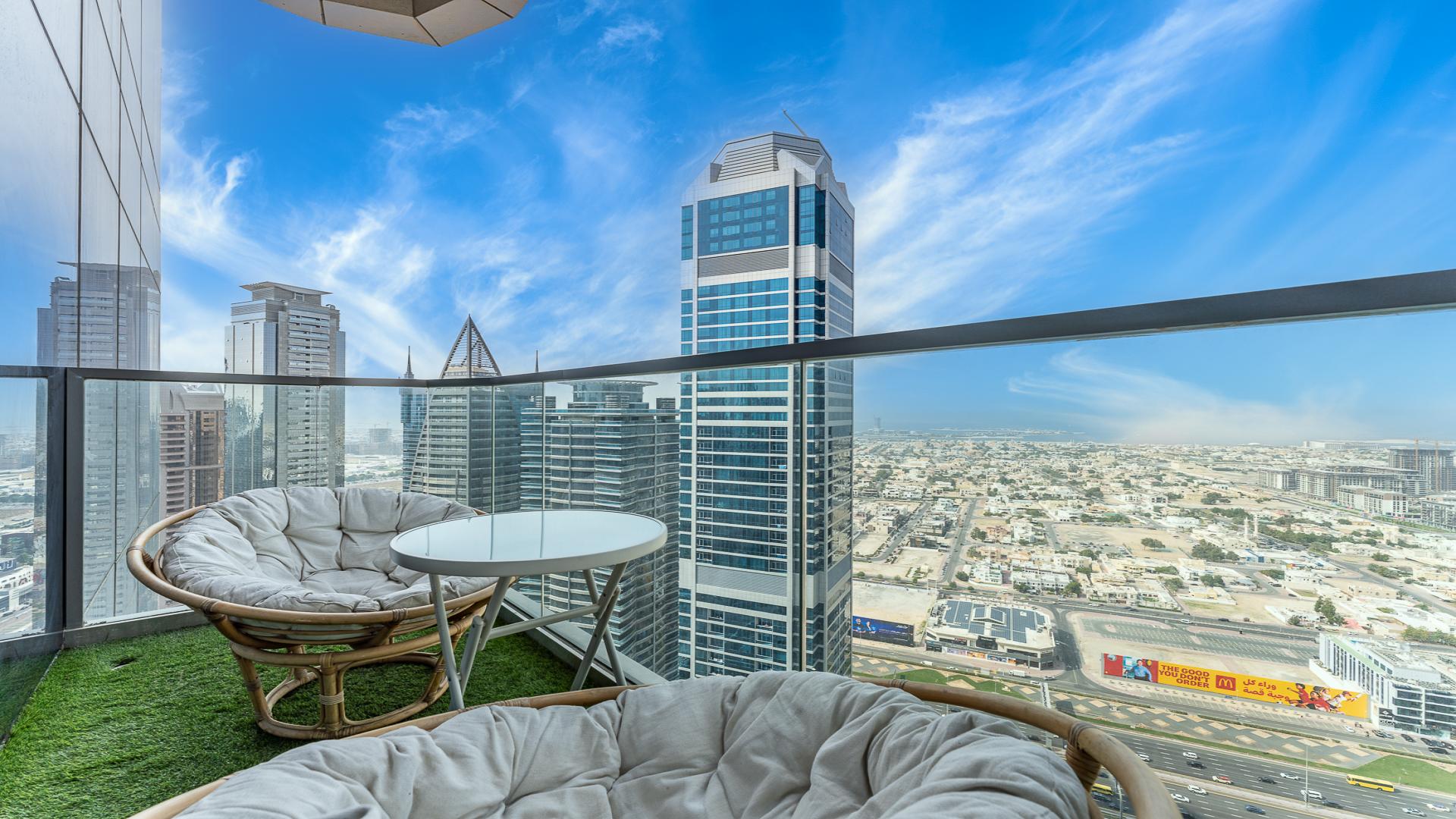 Modern living and dining area in Business Bay serviced residence, Paramount Tower Hotel & Residences