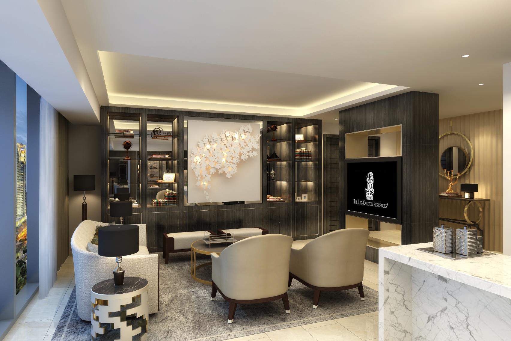 Entrance of The Ritz Carlton Serviced Residences, Kuala Lumpur, with illuminated sign and fountain