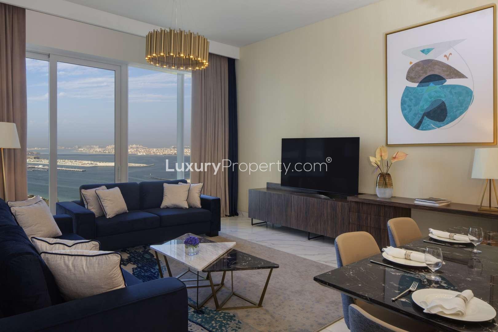 Modern open-plan living and dining area in Dubai Media City serviced apartment