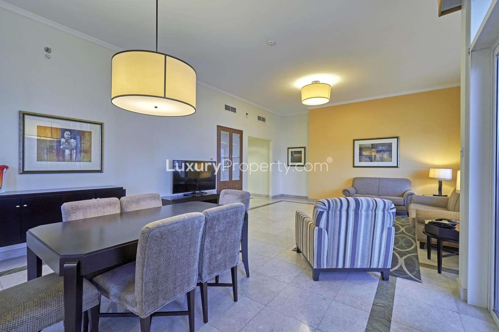 Tall luxury apartment building in Dubai Marina, Marriott Harbour Hotel and Suites