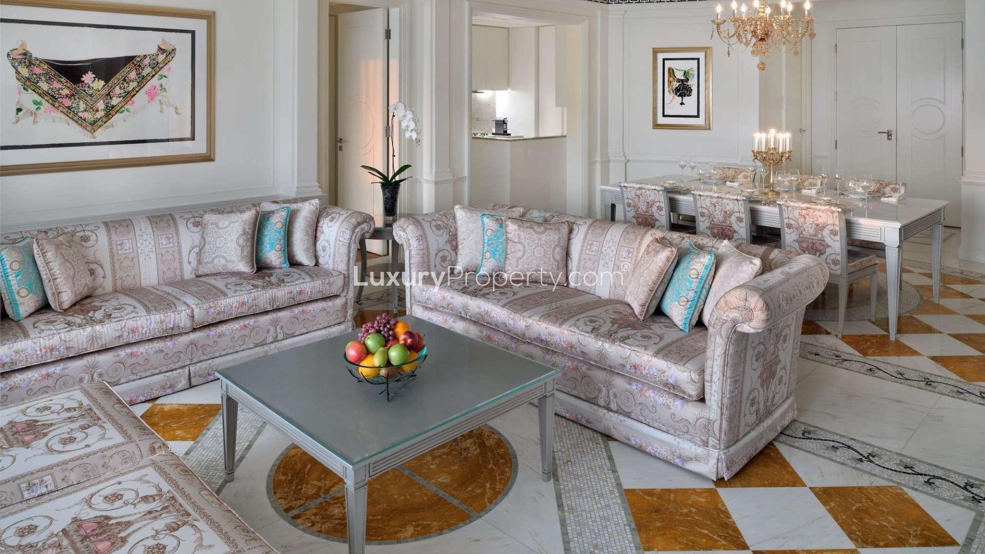 "Luxurious Palazzo Versace apartment exterior at night, Culture Village waterfront view, LP10579.",N/A,Luxurious bedroom in two-bed apartment at Palazzo Versace, Culture Village, available for rent