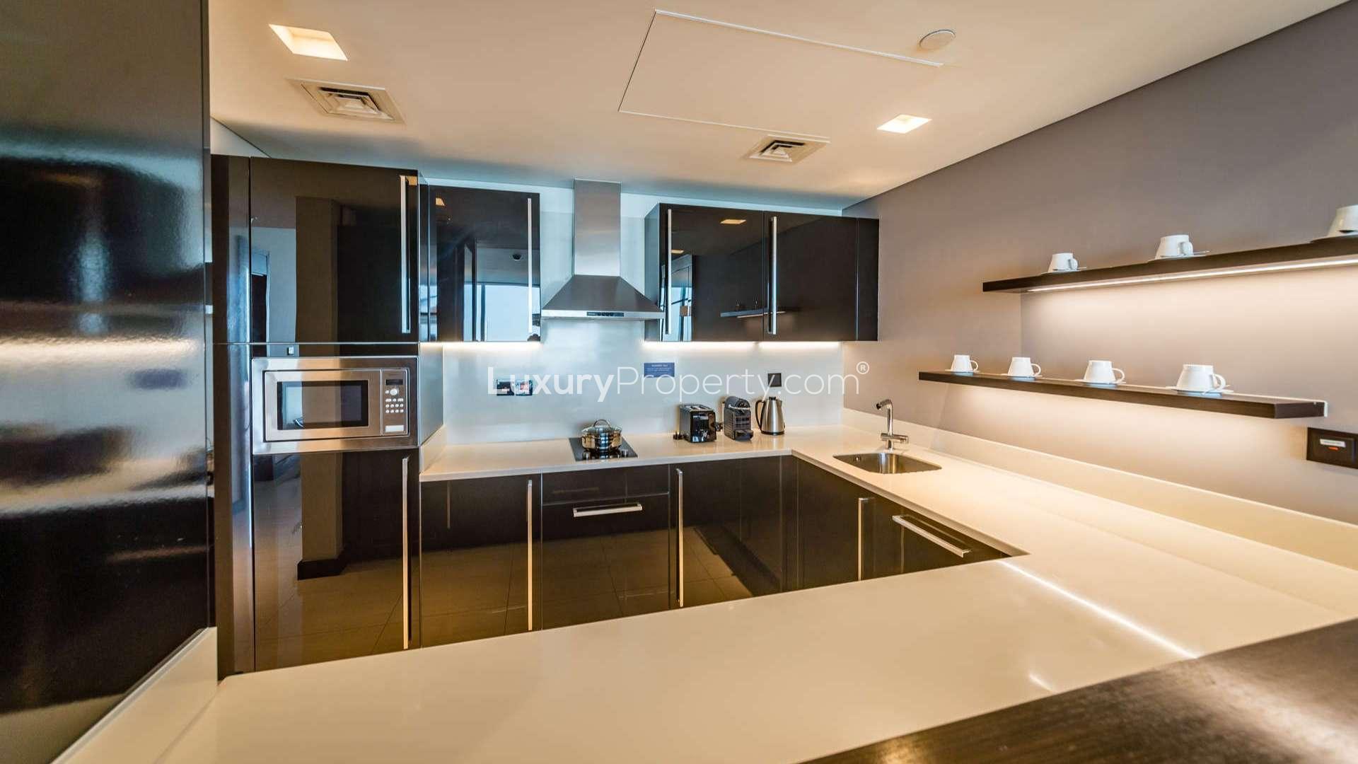 Luxurious bathroom in serviced apartment, Sheikh Zayed Road, modern fixtures, spacious layout