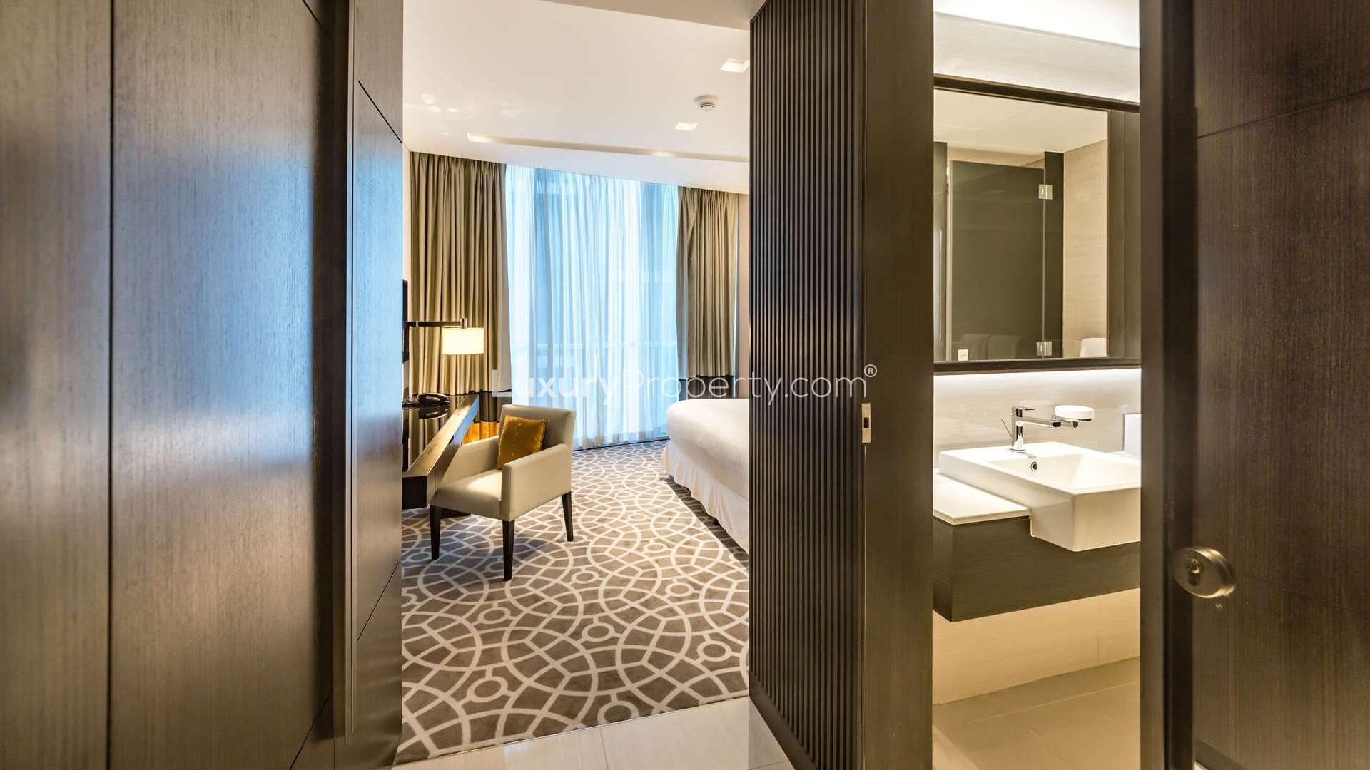 Modern living room and kitchen in serviced apartment, Sheikh Zayed Road, Sheraton Grand Hotel