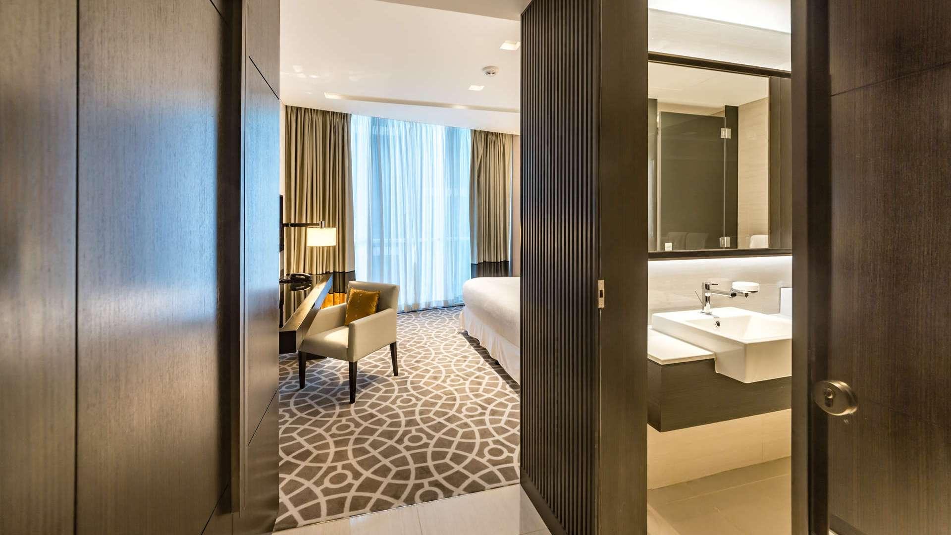 Modern living room and kitchen in serviced apartment, Sheikh Zayed Road, Sheraton Grand Hotel