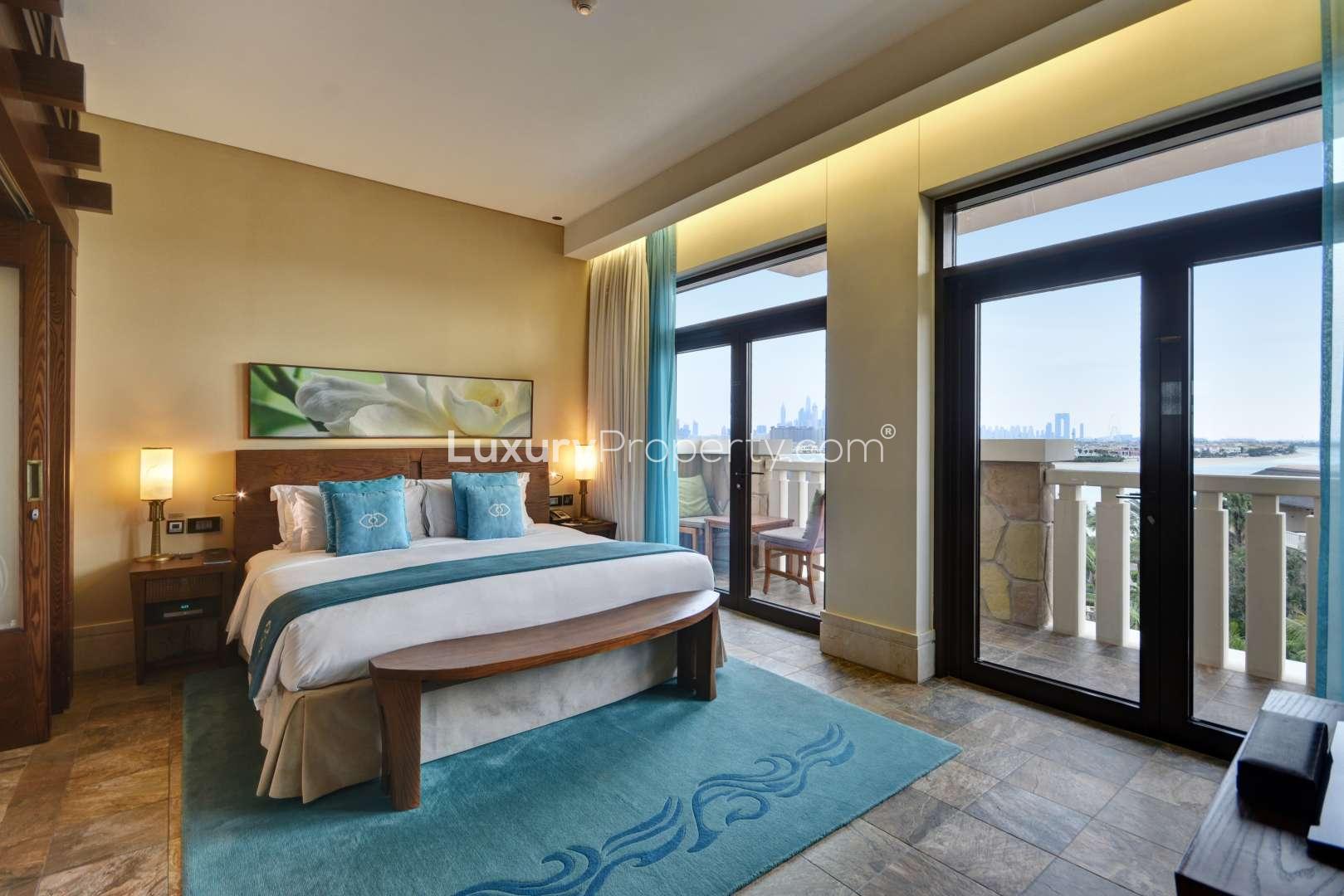 Luxurious kitchen in Sofitel the Palm serviced residence, Palm Jumeirah, with modern wood finishes