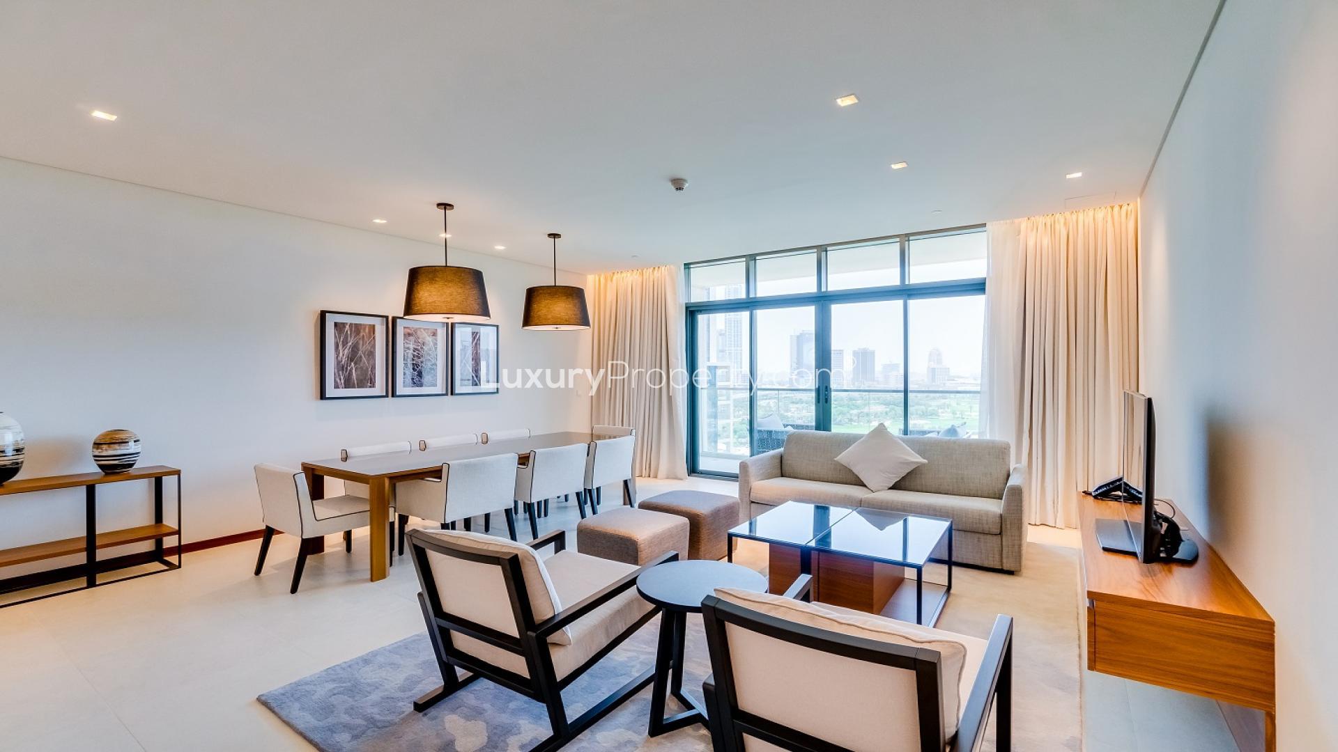 Modern serviced apartment pool with golf course views at Vida Residence, The Hills