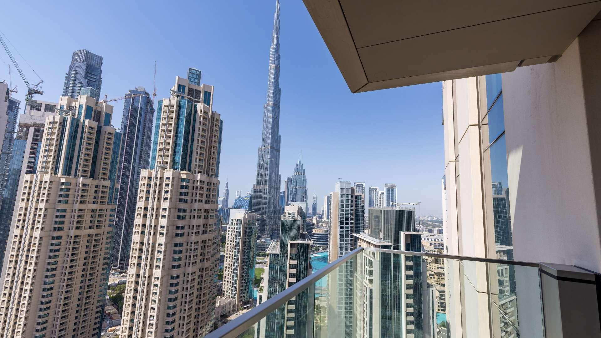 Contemporary living room in Vida Residence Downtown apartment with city views, Dubai