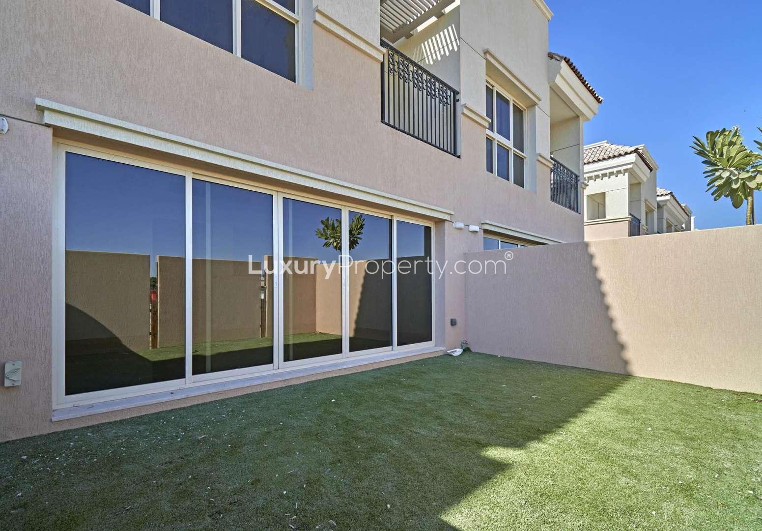 Bright interior view of townhouse in Al Andalus, Jumeirah Golf Estates with open door