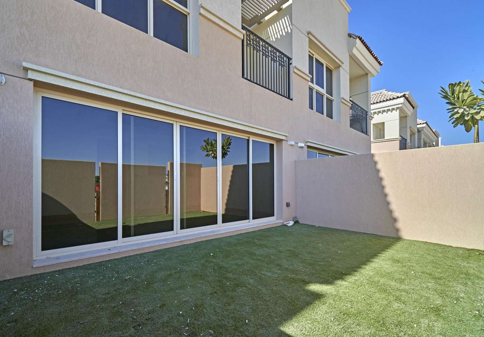 Bright interior view of townhouse in Al Andalus, Jumeirah Golf Estates with open door