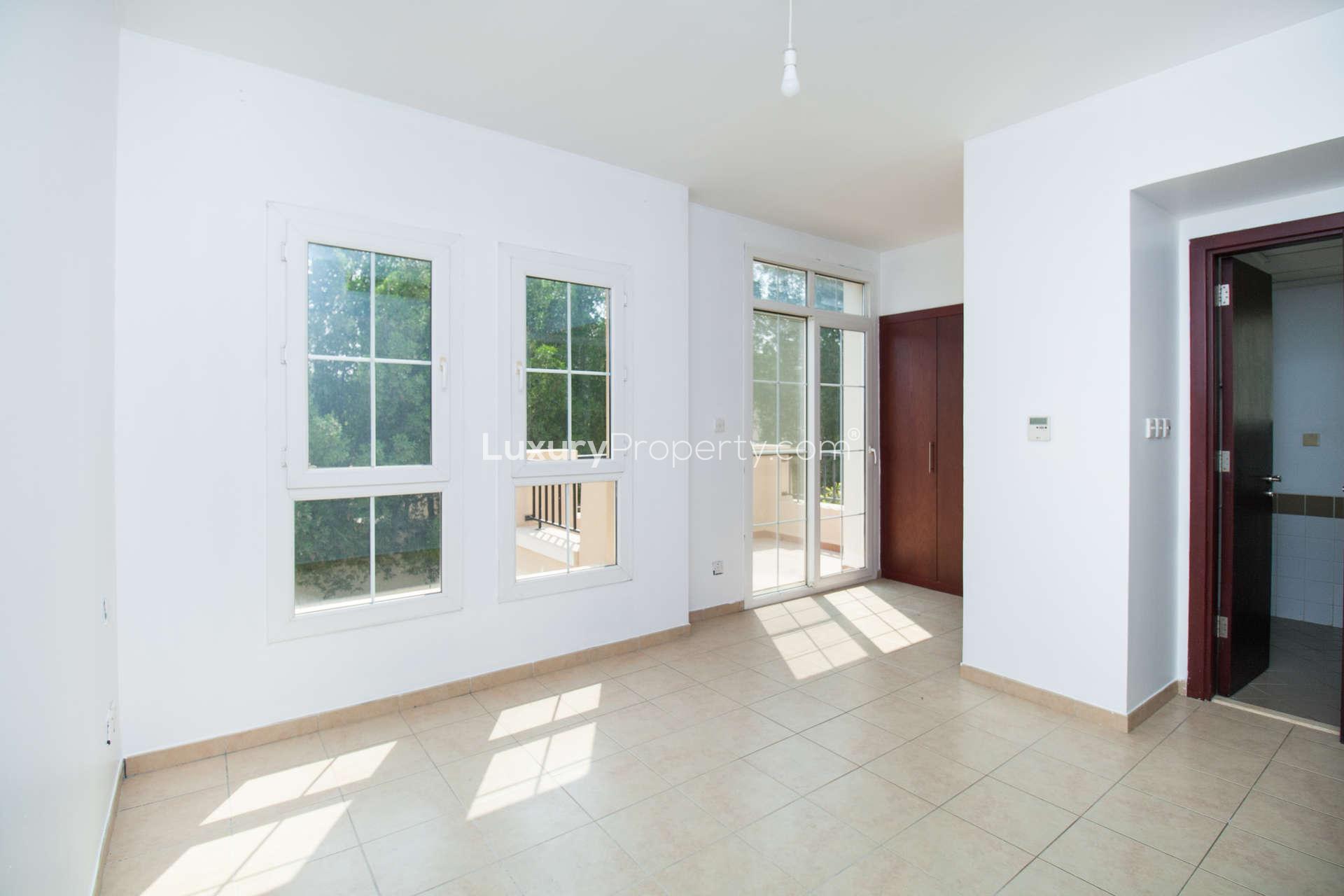 Bright living area in 2-bedroom townhouse, Al Reem, Arabian Ranches, with large windows