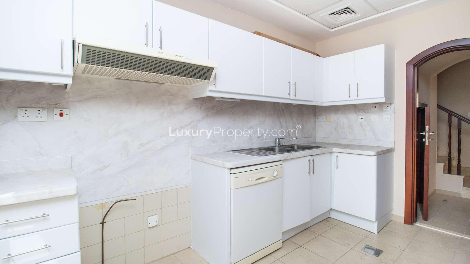 Bright living room with garden view in Al Reem townhouse, Arabian Ranches