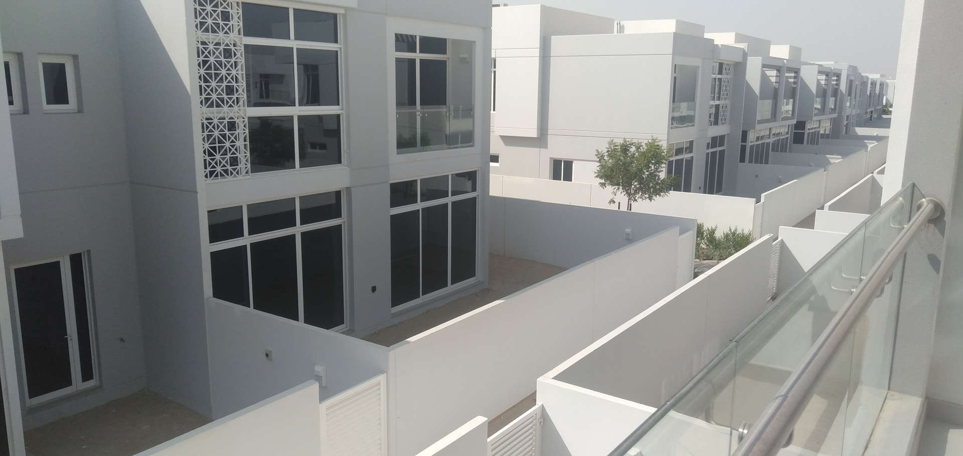 Bright living area with modern windows in Arabella 2 townhouse, Mudon community