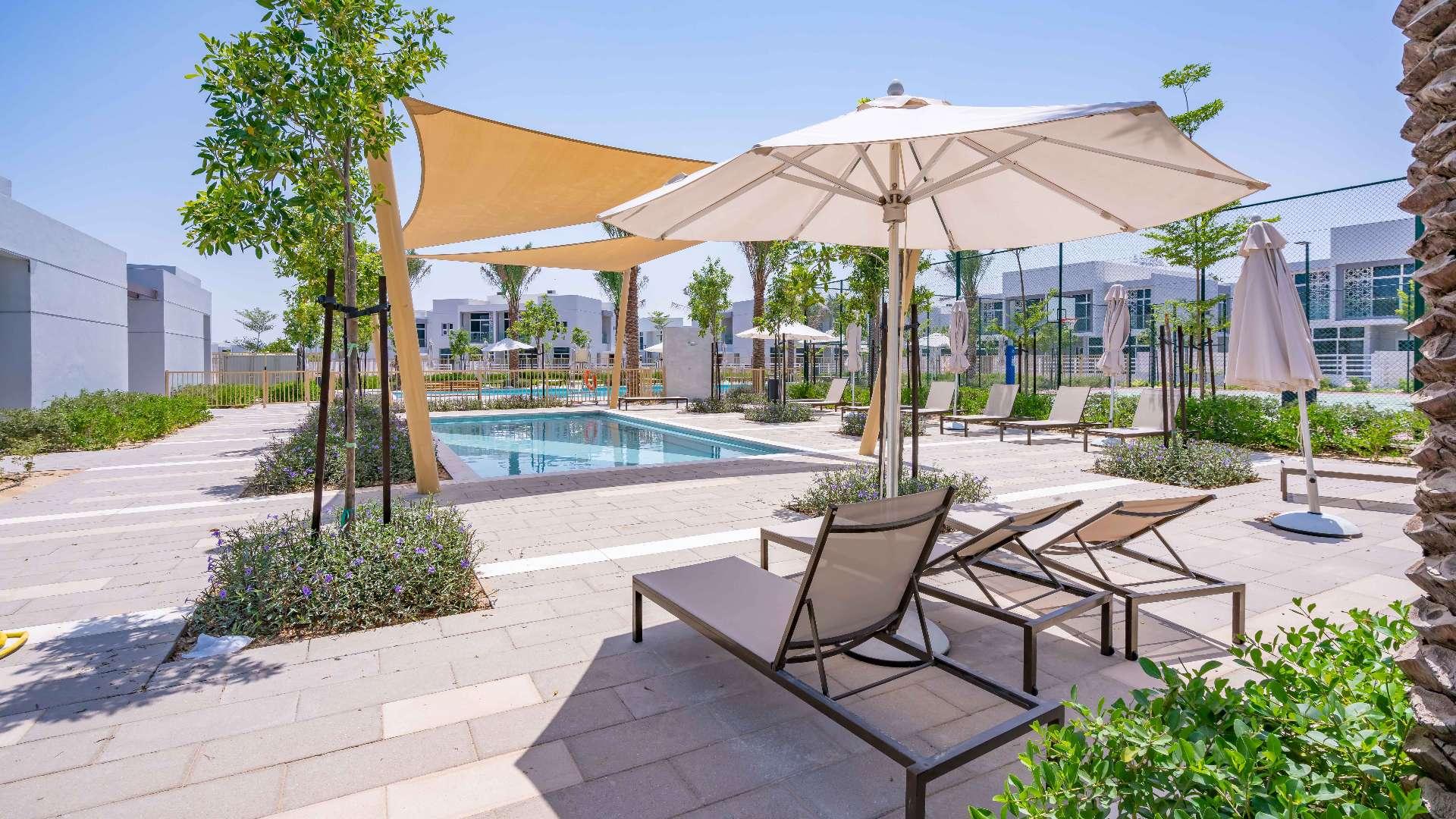 Modern kitchen in spacious 2-bedroom townhouse, Arabella, Mudon. Features sleek cabinetry and countertops