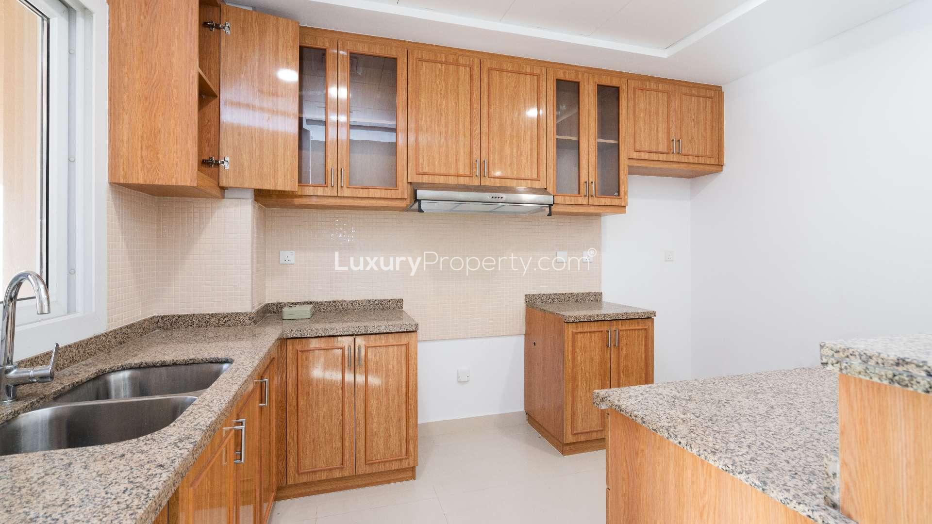 Bright kitchen and living area in Bella Casa townhouse for rent, Serena, Dubai