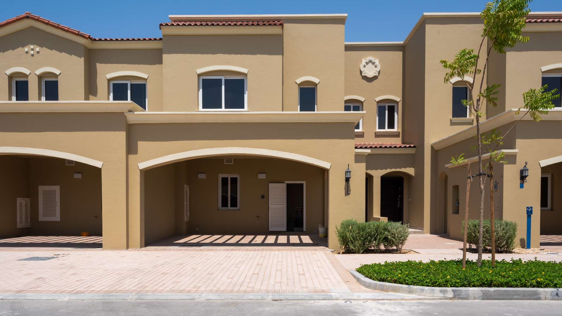 Modern kitchen and staircase in Bella Casa two-bedroom townhouse, Serena community