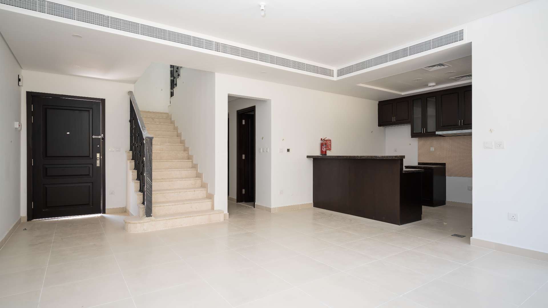 Elegant townhouse exterior in Bella Casa, Serena community available for rent