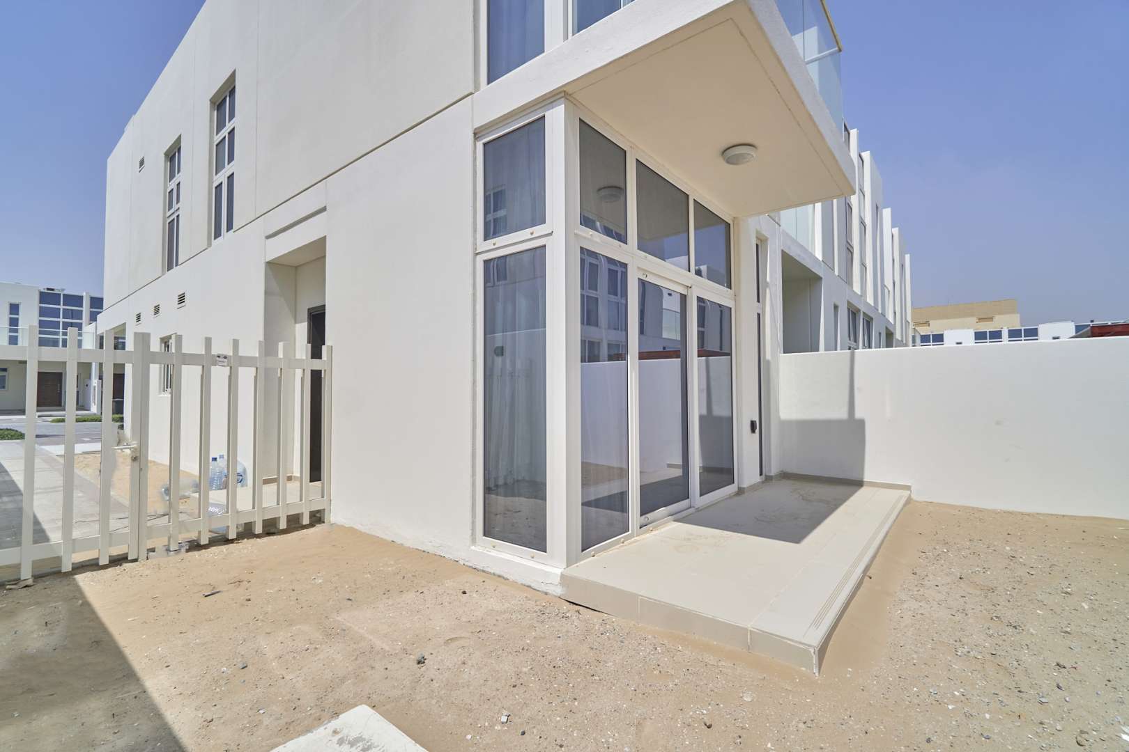 Furnished 2-bedroom townhouse exterior in Damac Hills 2, Akoya Pacifica community for rent