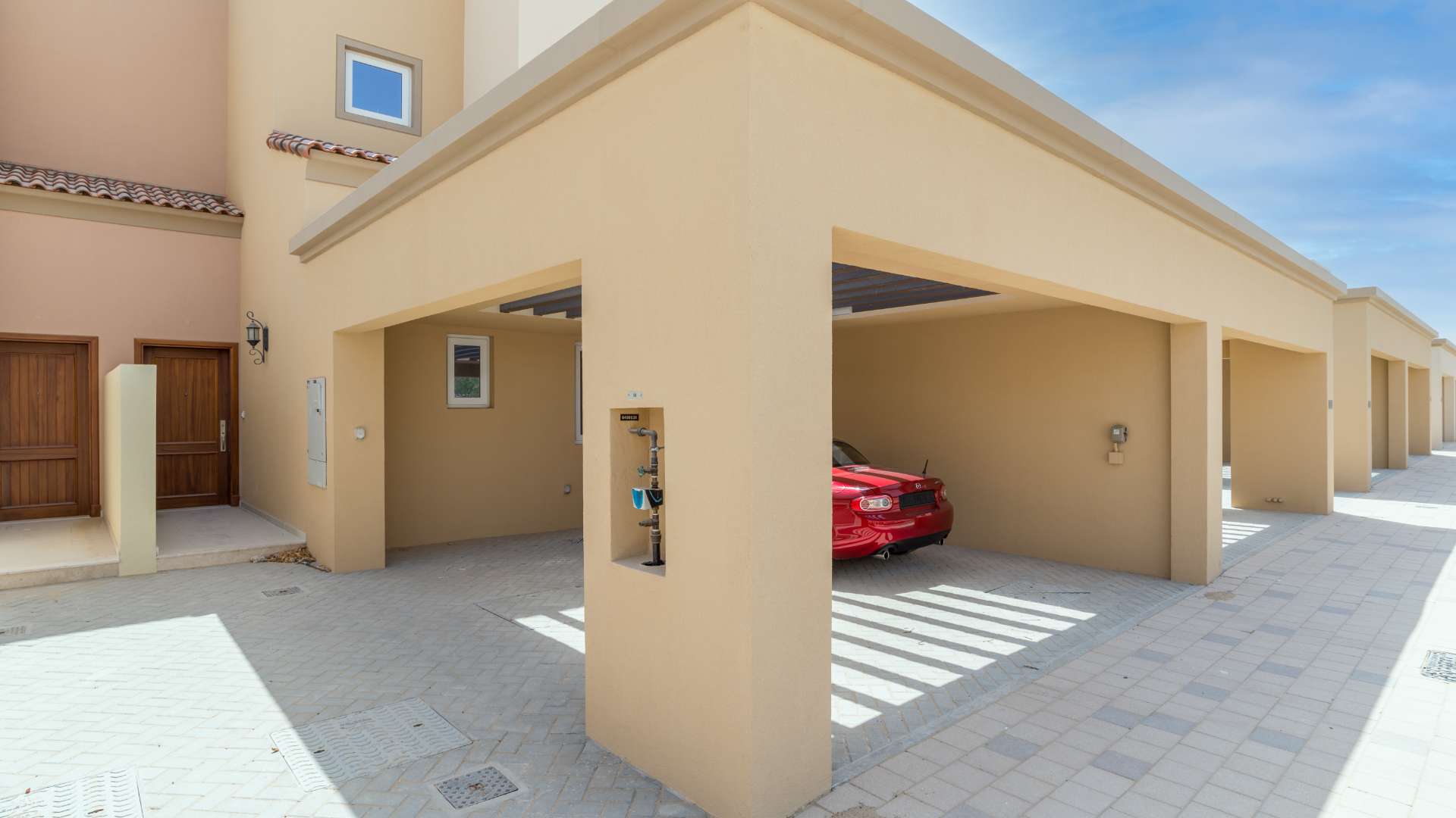 Modern kitchen and living area in Villanova townhouse for sale, Dubai Land