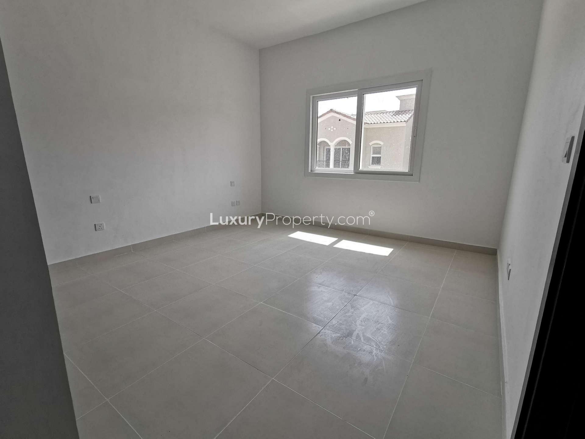 Staircase and hallway in elegant 2-bedroom townhouse for sale in Casa Dora, Serena