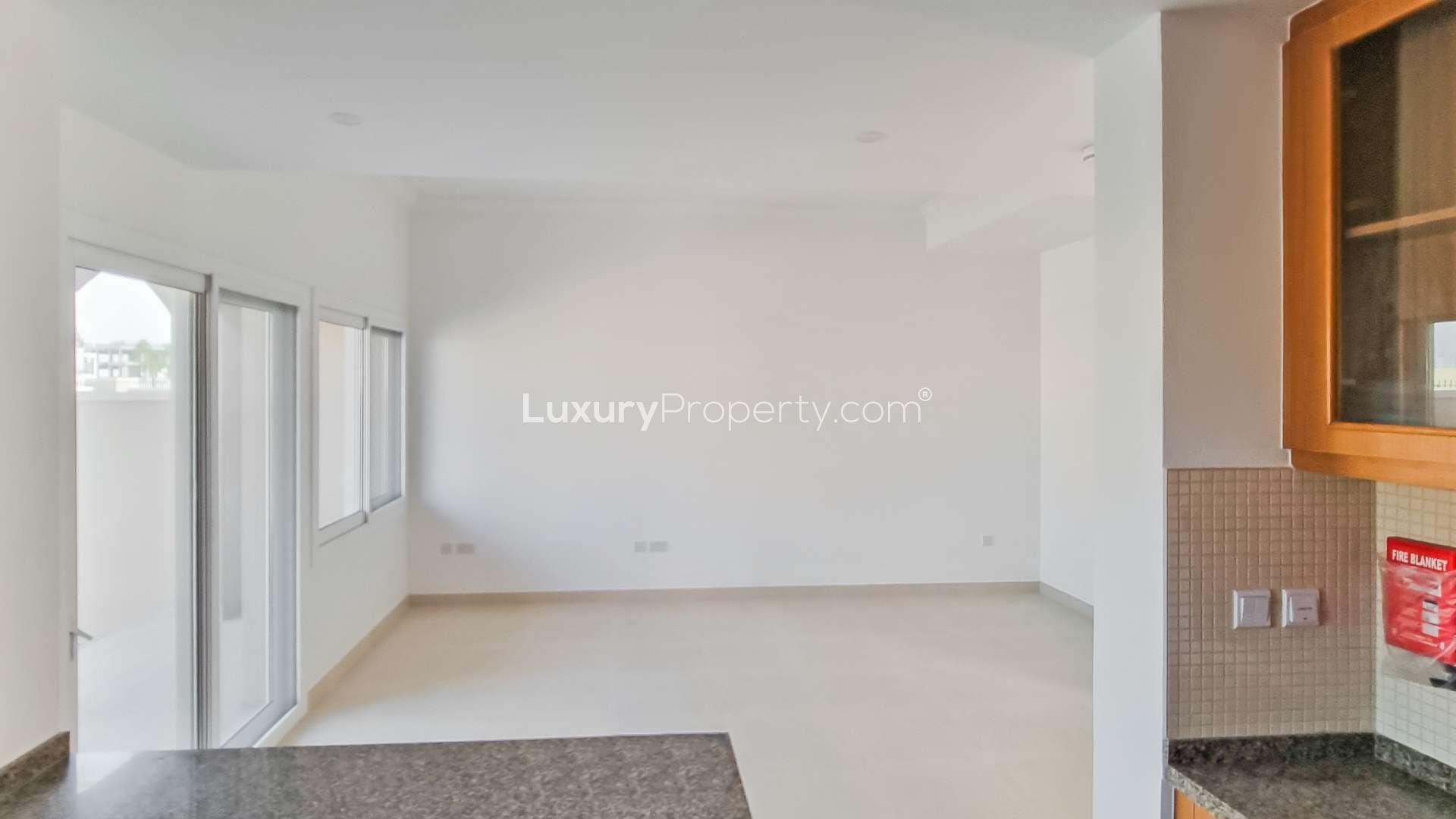 Single row 2-bedroom townhouse exterior in Serena, Casa Viva with garden view