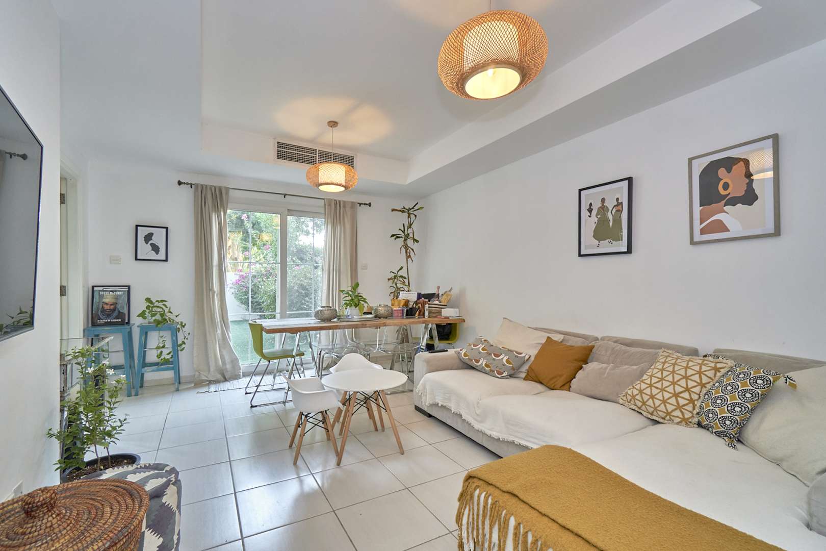 Single row villa exterior with covered parking in Springs 12, The Springs community