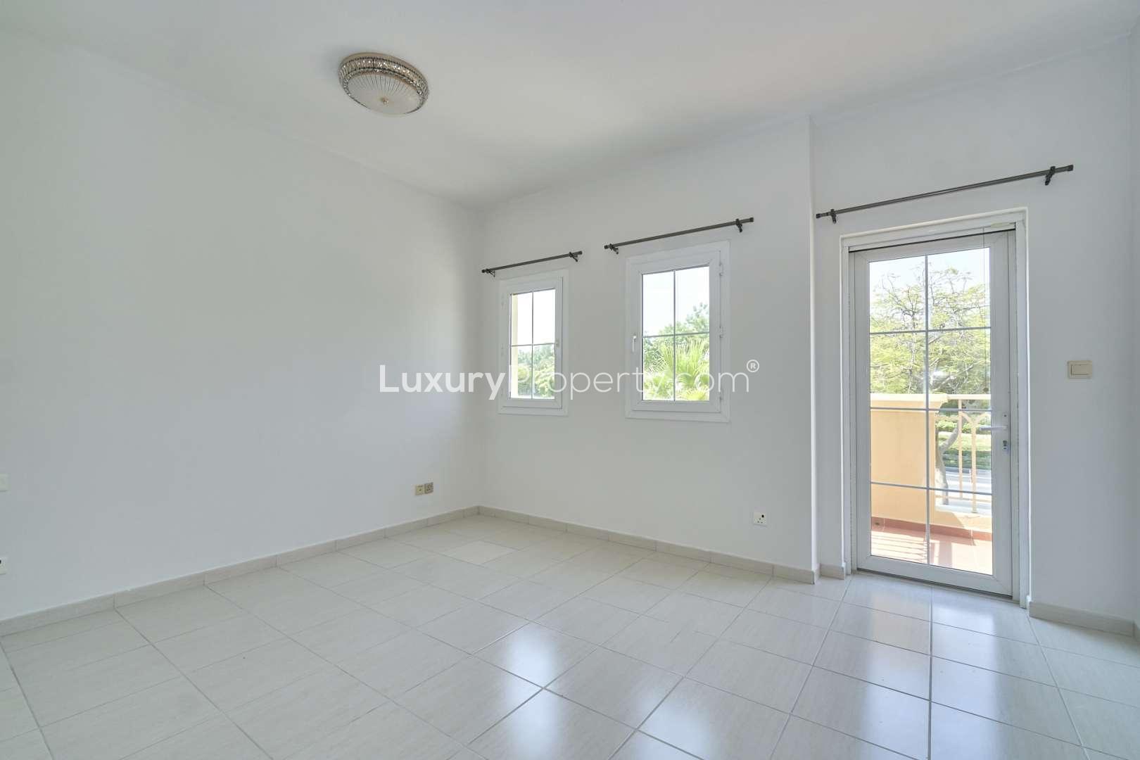 Interior view of 2-bedroom villa in Springs 2, Emirates Living, featuring bright window