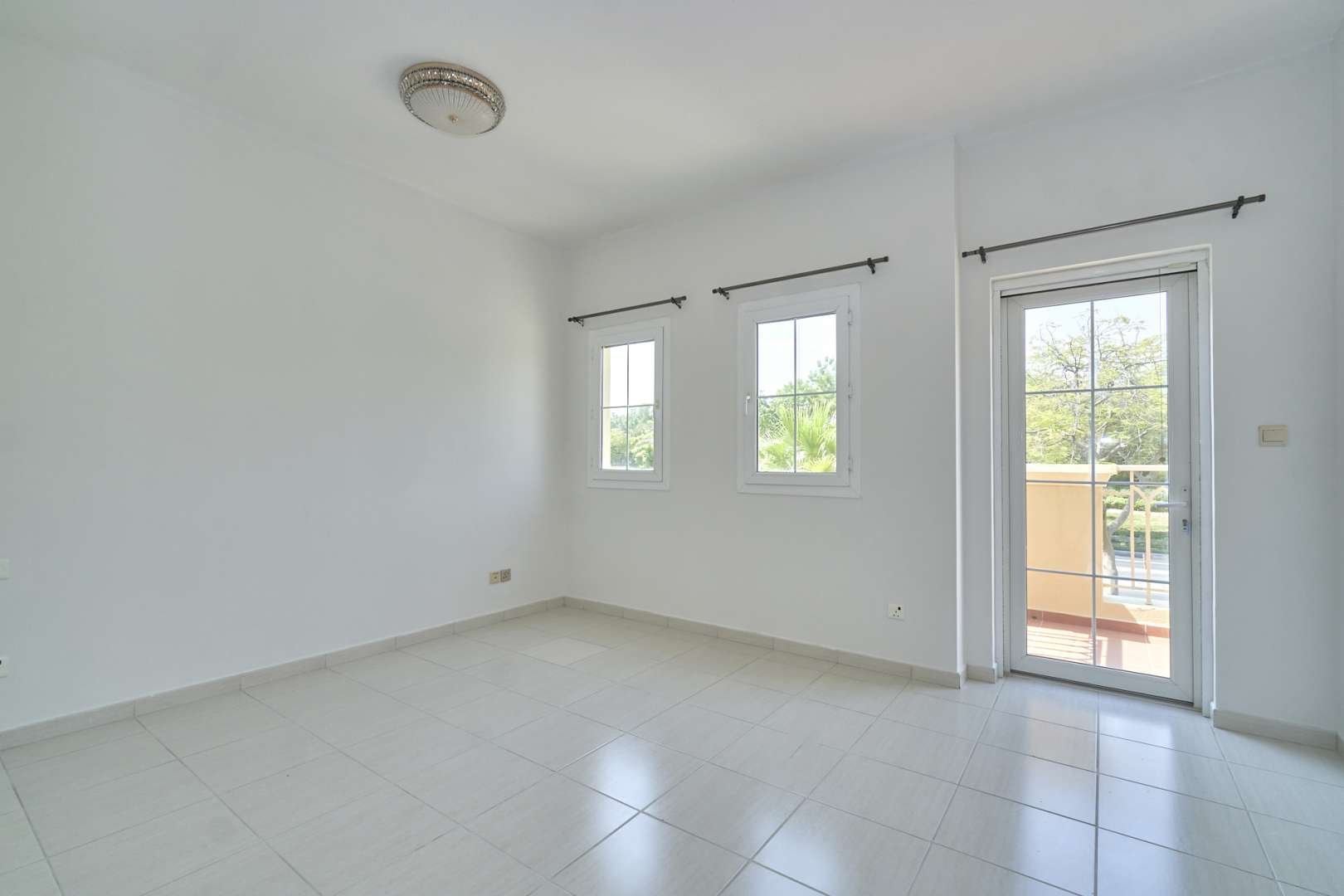 Interior view of 2-bedroom villa in Springs 2, Emirates Living, featuring bright window