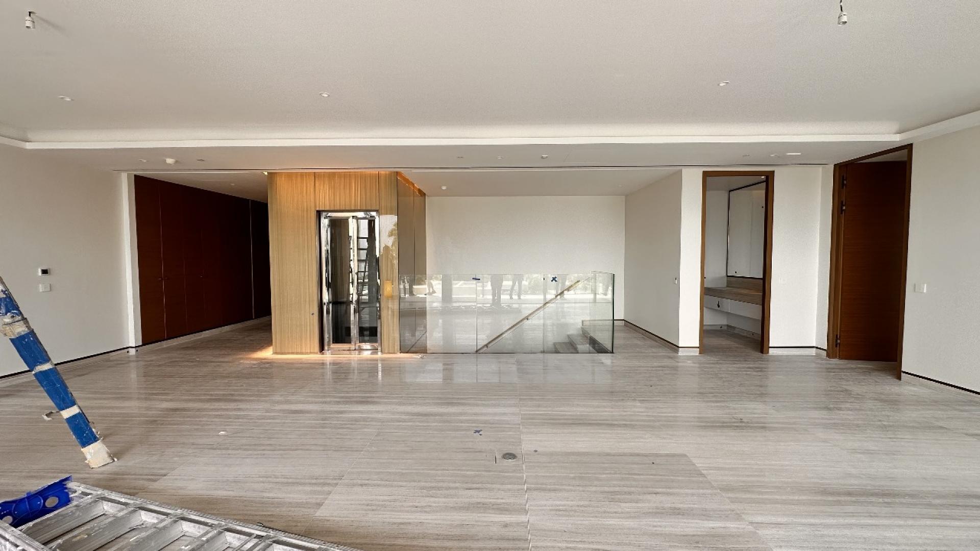 Spacious open-plan living area in 2-bedroom townhouse, Royal Atlantis, Palm Jumeirah, Dubai