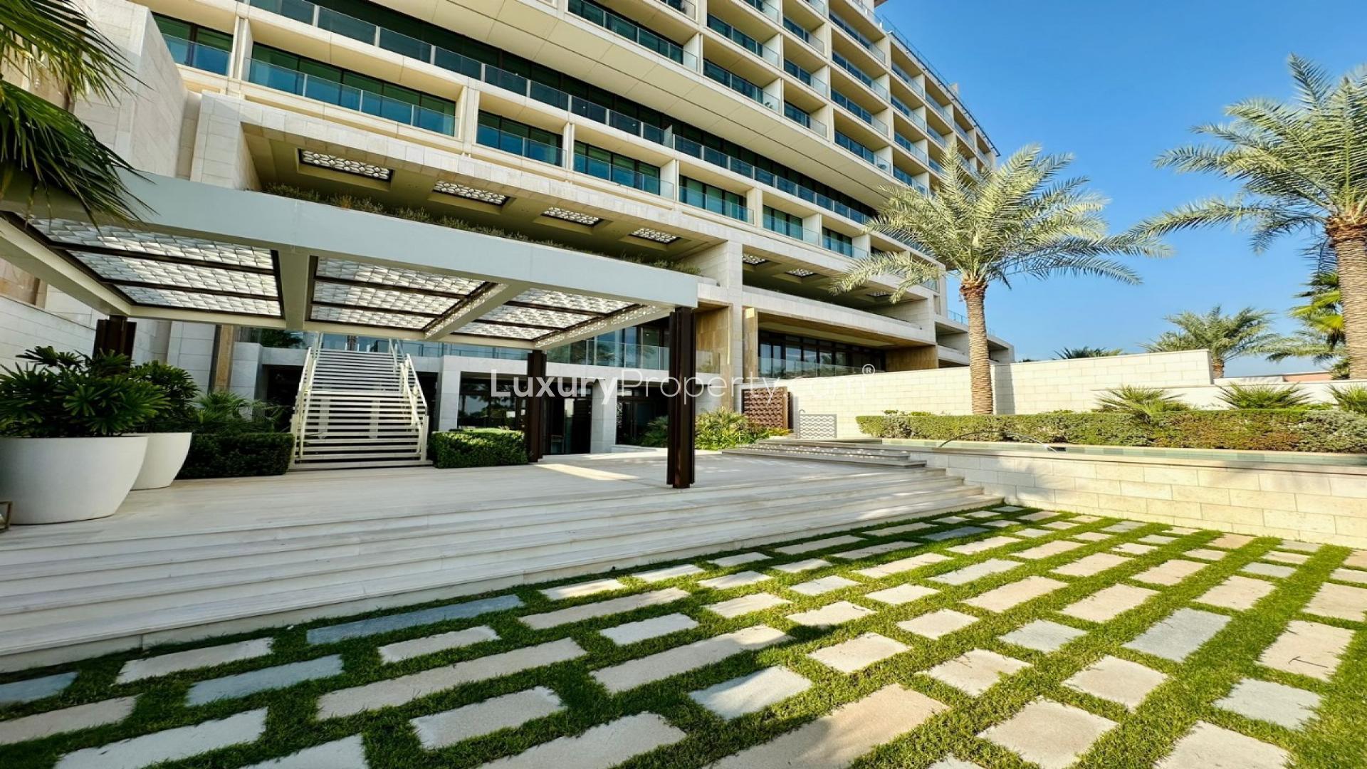 "Spacious living area with floor-to-ceiling windows, Palm Jumeirah townhouse, Atlantis The Royal Residences.",Entrance of luxurious duplex townhouse at Atlantis The Royal Residences, Palm Jumeirah
