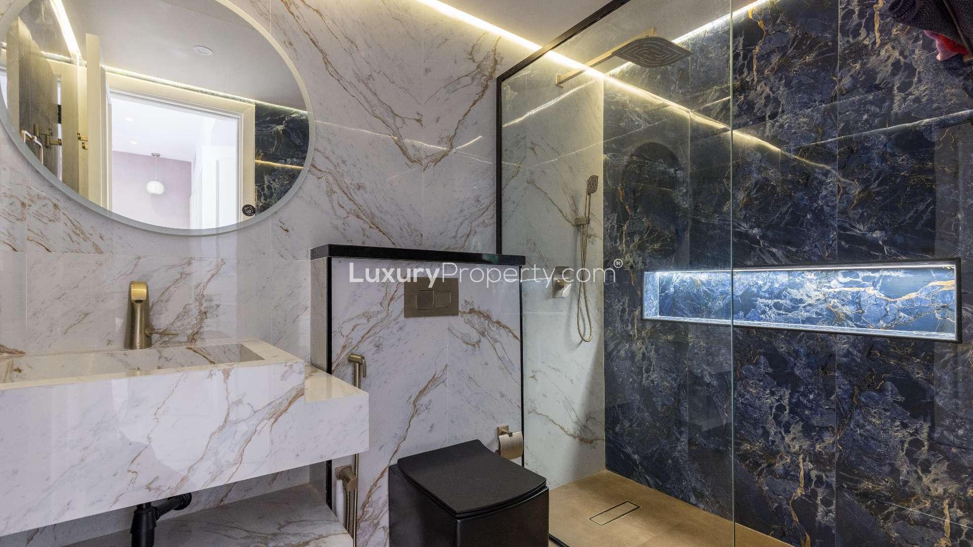 Elegant living room in 2-bedroom townhouse, The Springs, Emirates Living. Modern decor, spacious interior