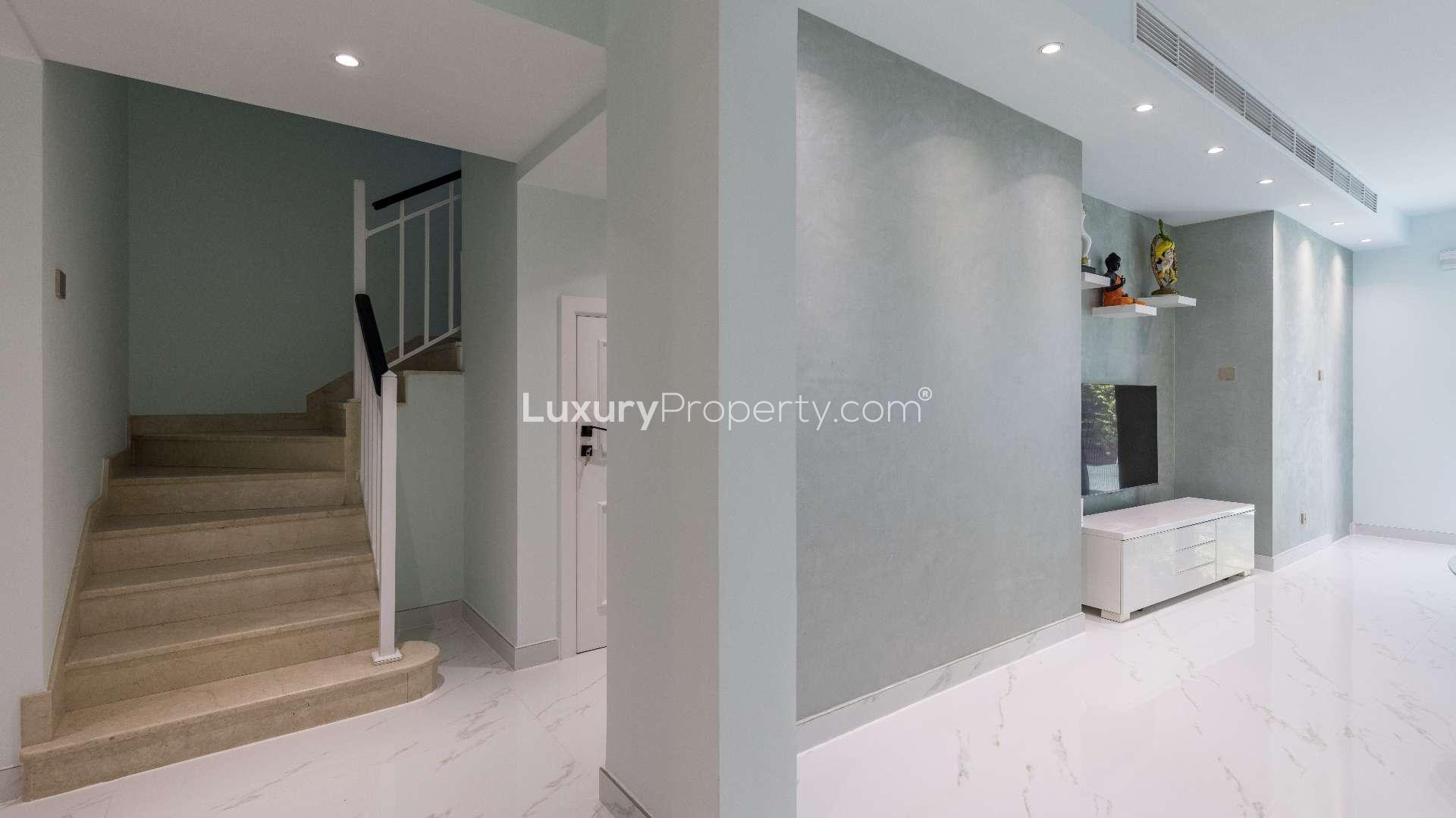 Luxurious bathroom in 2-bedroom townhouse, The Springs, Emirates Living, featuring marble finishes and shower