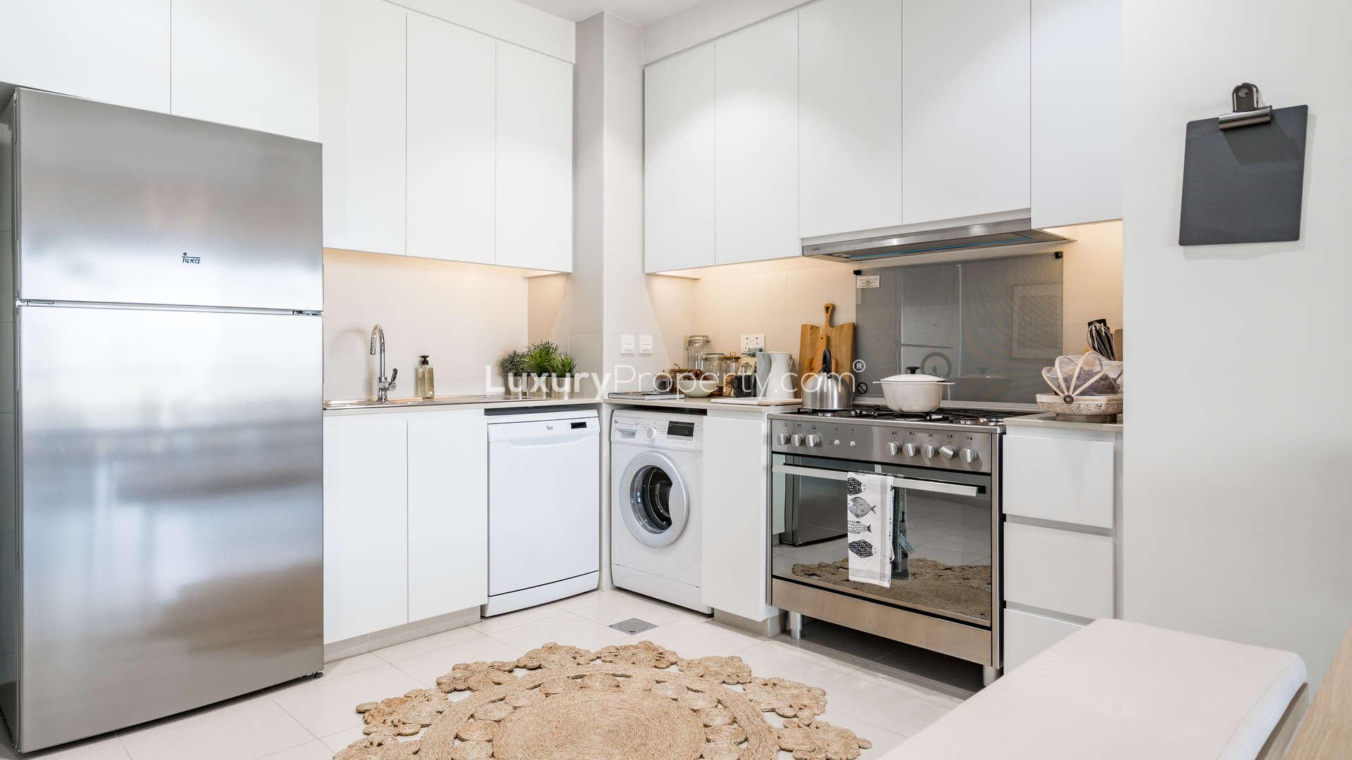 Modern kitchen in 2-bedroom townhouse, Urbana, Emaar South, Dubai South. Bright and spacious design