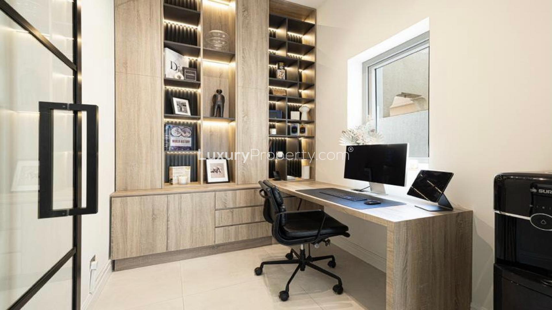 "Modern home office with built-in shelves in Springs 12 villa for rent, LP40161.","Modern home office in fully upgraded villa, The Springs 12, for rent, two bedrooms.",Outdoor dining area in upgraded villa at Springs 12, perfect for entertaining. Rent now