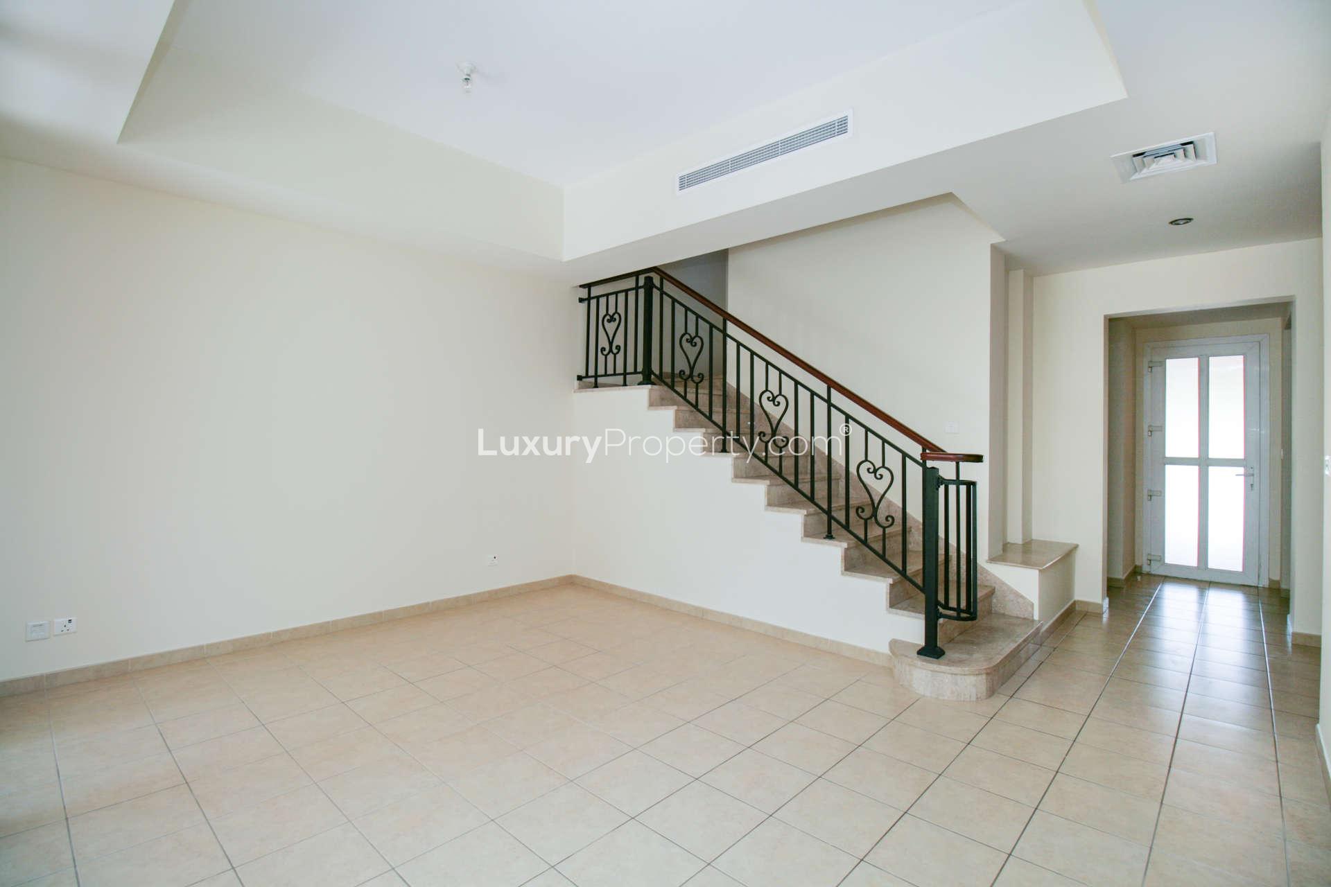 Modern kitchen in 2-bedroom villa, Palmera 1, Arabian Ranches, Dubai, with granite countertops