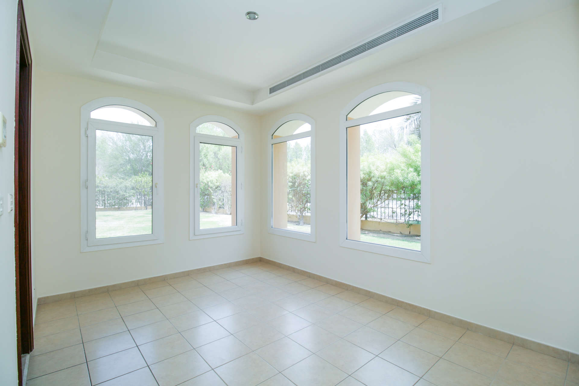 Bright living area with large windows in Palmera 1 villa, Arabian Ranches, Dubai